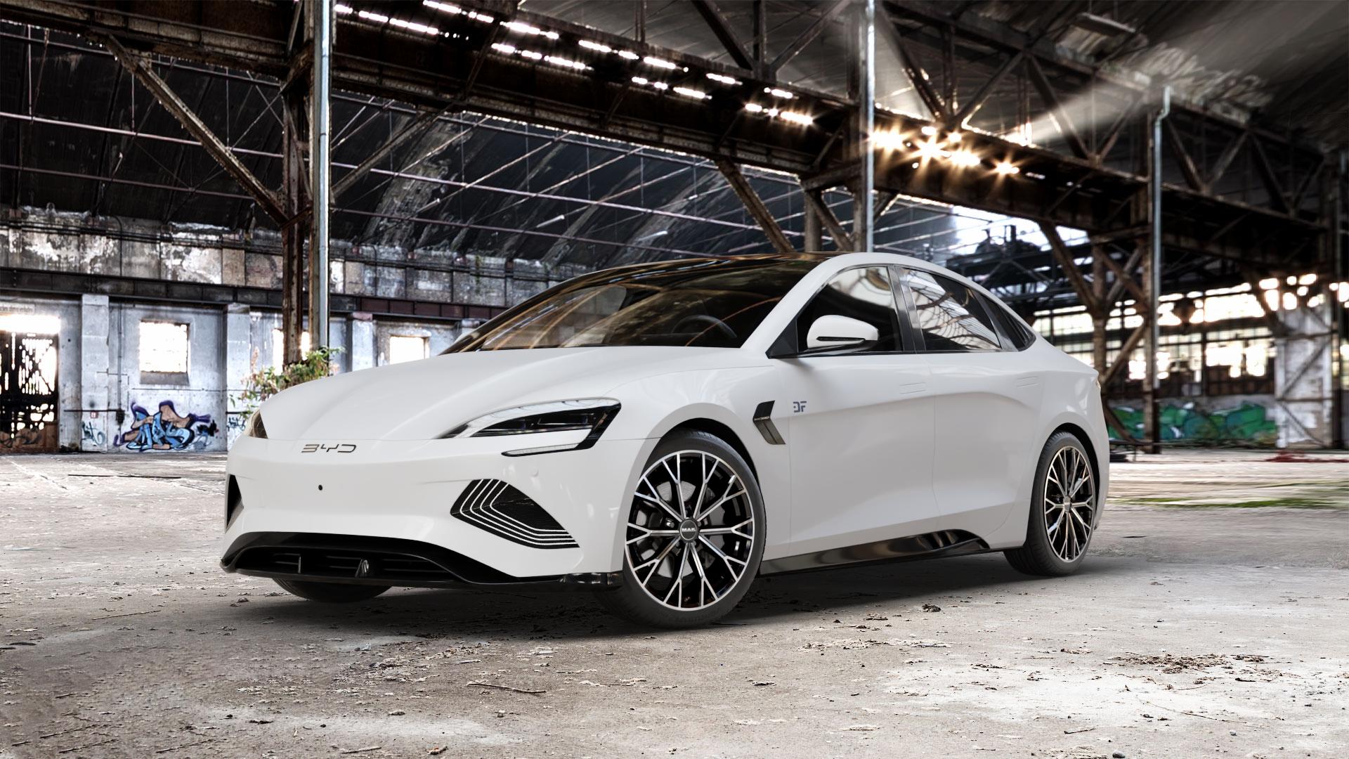 MAK Asphalt Black Mirror Felge mit Reifen schwarz in 19Zoll Alufelge auf weissem BYD Seal Typ EK ⬇️ mit 15mm Tieferlegung ⬇️ Old Industrial Hall_max_5300mm_2024 Frontansicht_1