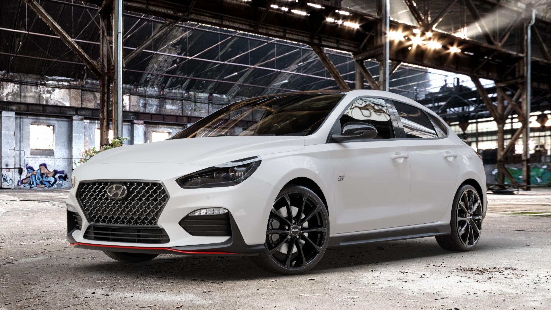 MAK Davinci Gloss Black Felge mit Reifen schwarz in 19Zoll Winterfelge Alufelge auf weissem Hyundai i30 Typ PDE Fastback ⬇️ mit 15mm Tieferlegung ⬇️ Old Industrial Hall_max_4400mm_2024 Frontansicht_1