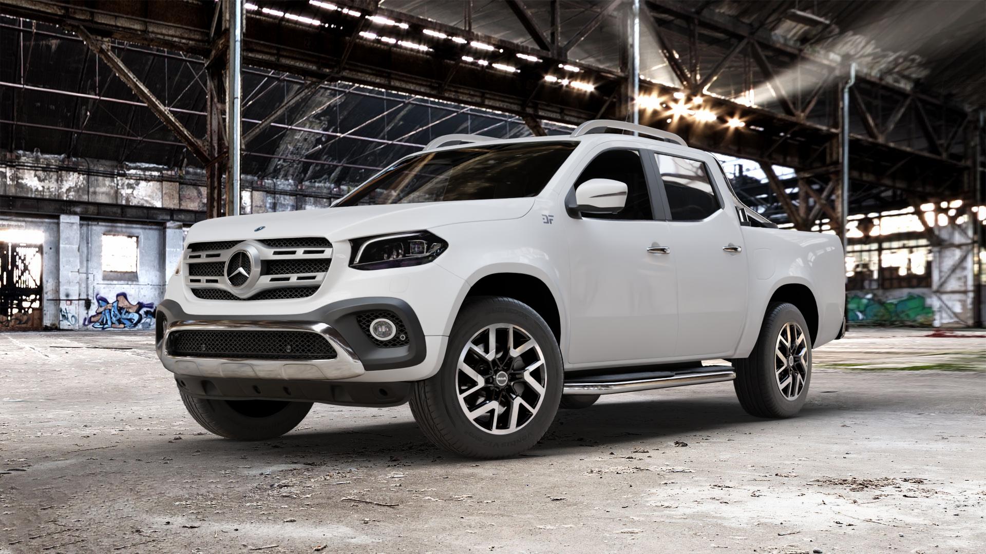 MAK Gravel Black Mirror Felge mit Reifen silber schwarz in 18Zoll Alufelge auf weissem Mercedes X-Klasse ⬇️ mit 15mm Tieferlegung ⬇️ Old Industrial Hall_max_5300mm_2024 Frontansicht_1