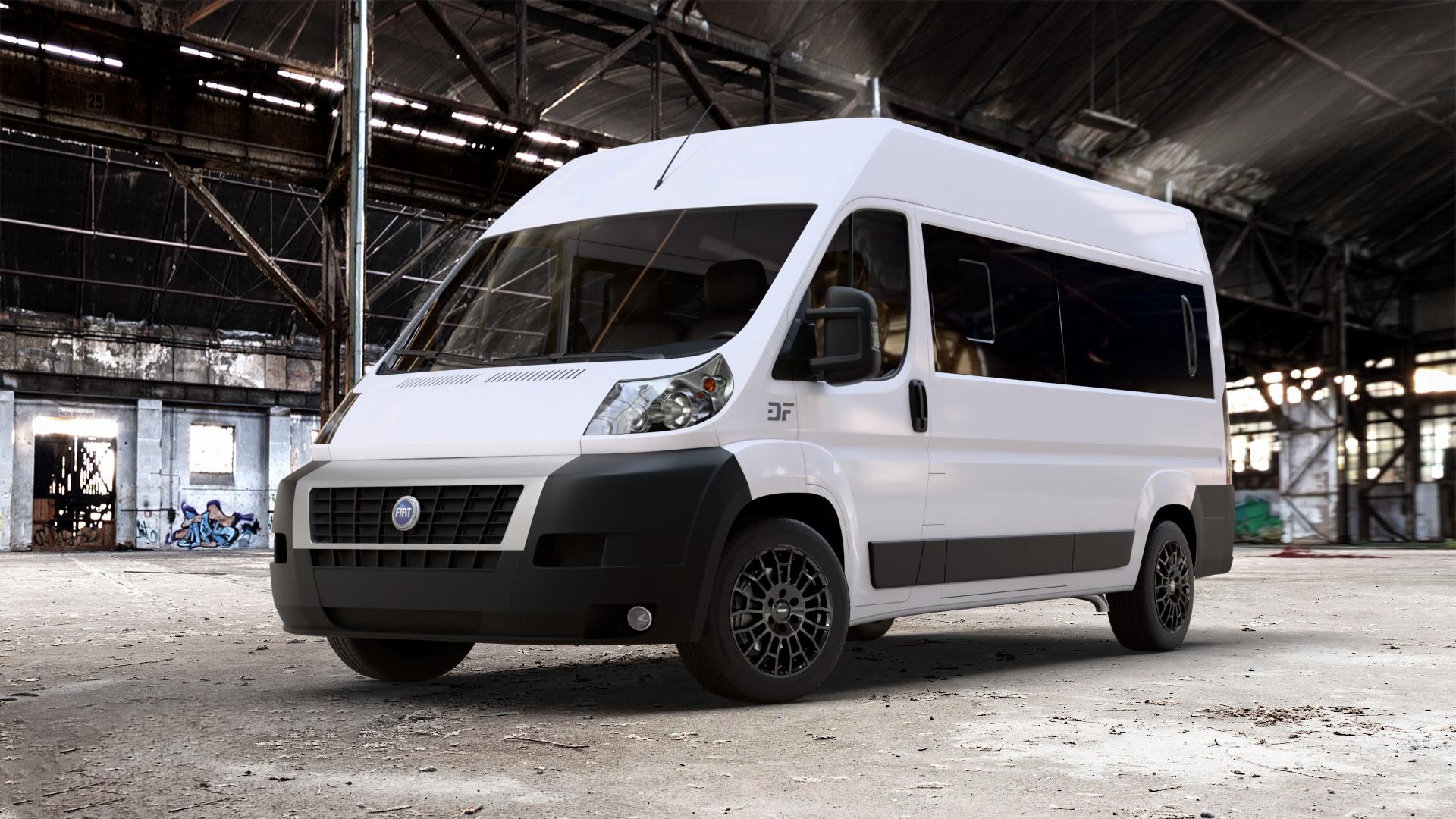 MAK Nomad Gloss Black Felge mit Reifen schwarz in 18Zoll Alufelge auf weissem Fiat Ducato Bus Typ 250 ⬇️ mit 15mm Tieferlegung ⬇️ Old Industrial Hall_max_7000mm_2024 Frontansicht_1