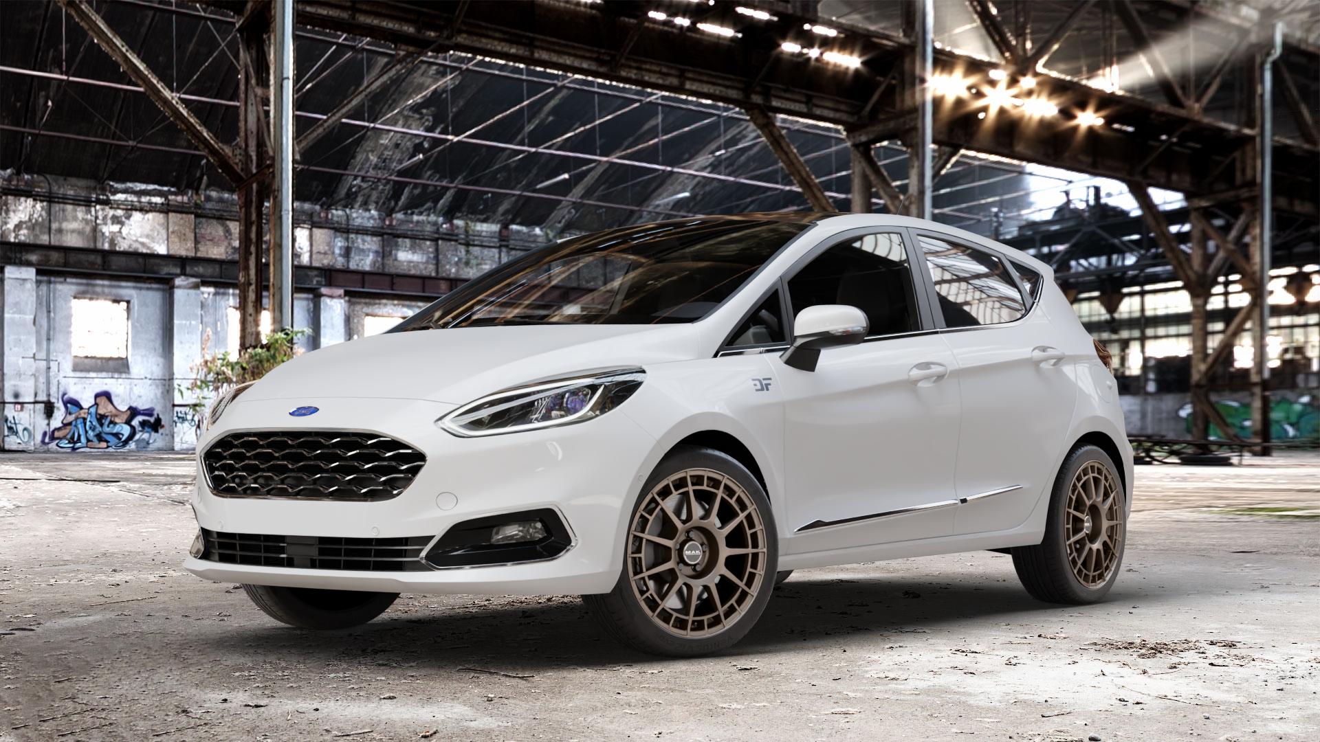 MAK NTT Matt Bronze Felge mit Reifen in 17Zoll Winterfelge Alufelge auf weissem Ford Fiesta VII Typ JHH ⬇️ mit 15mm Tieferlegung ⬇️ Old Industrial Hall_max_4400mm_2024 Frontansicht_1