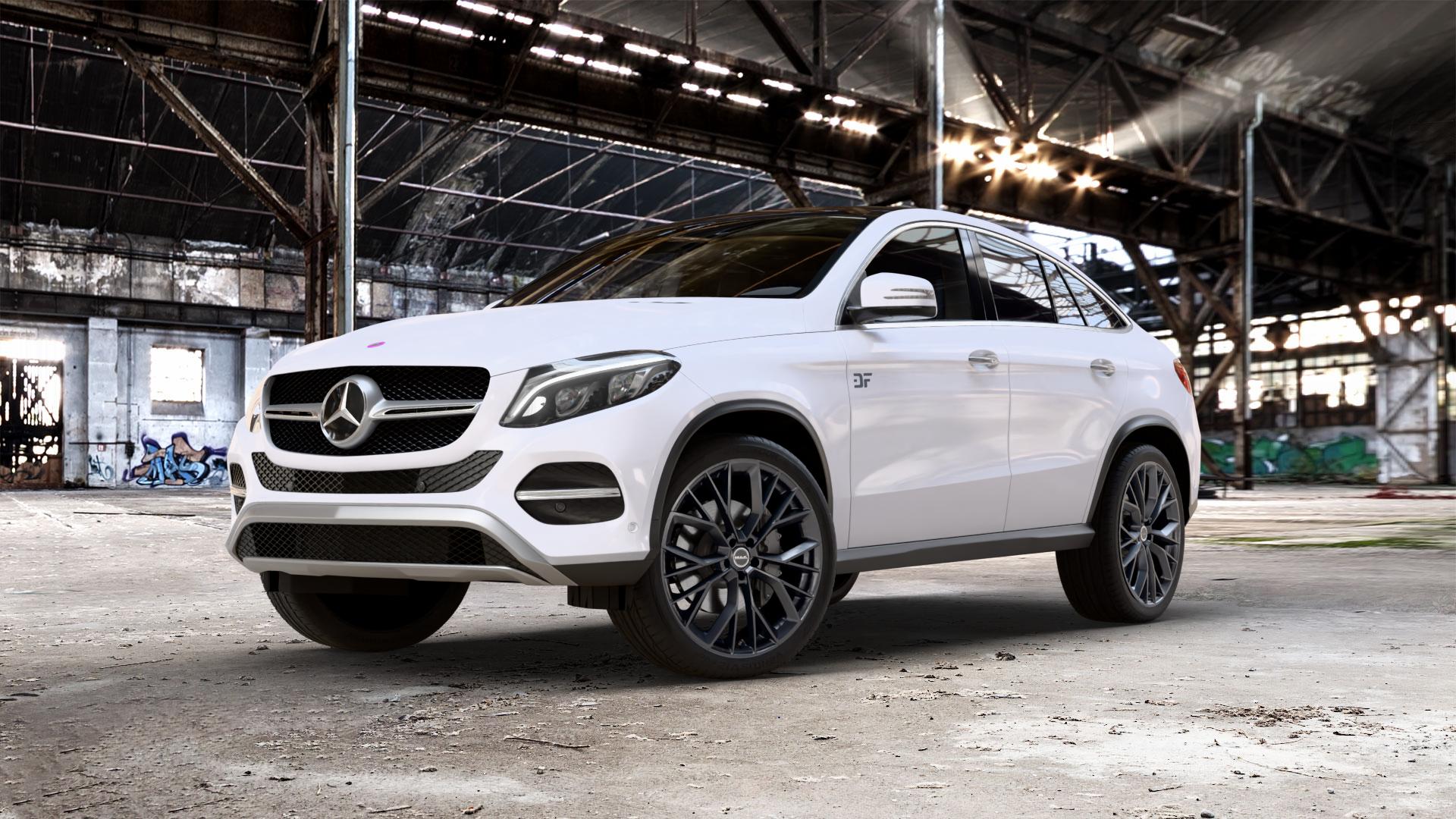 MAK Stilo Gloss Black Felge mit Reifen schwarz in 22Zoll Winterfelge Alufelge auf weissem Mercedes GLE-Klasse Coupe Typ x166 ⬇️ mit 15mm Tieferlegung ⬇️ Old Industrial Hall_max_5300mm_2024 Frontansicht_1