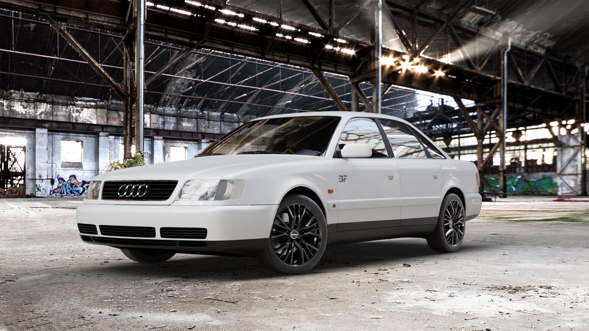 MAK Union Gloss Black Felge mit Reifen schwarz in 17Zoll Winterfelge Alufelge auf weissem Audi 100 Typ C4 (Limousine) A6 4A/C4 ⬇️ mit 15mm Tieferlegung ⬇️ Old Industrial Hall_max_5300mm_2024 Frontansicht_1