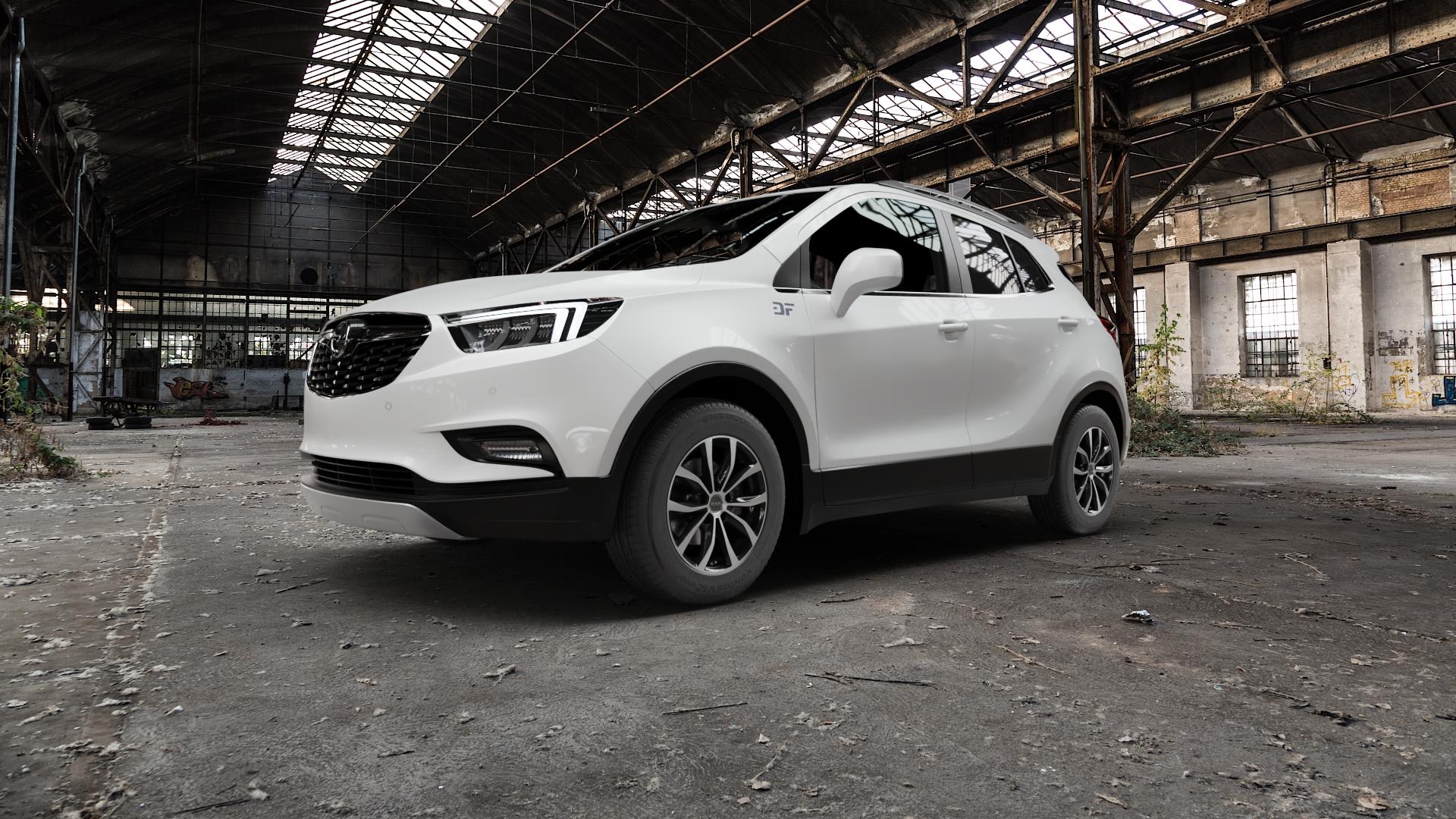 MAK Wolf Black Mirror Felge mit Reifen silber schwarz in 16Zoll Alufelge auf weissem Opel Mokka X Typ J-A ⬇️ mit 15mm Tieferlegung ⬇️ Old Industrial Hall_max5000mm_2022 Frontansicht_1
