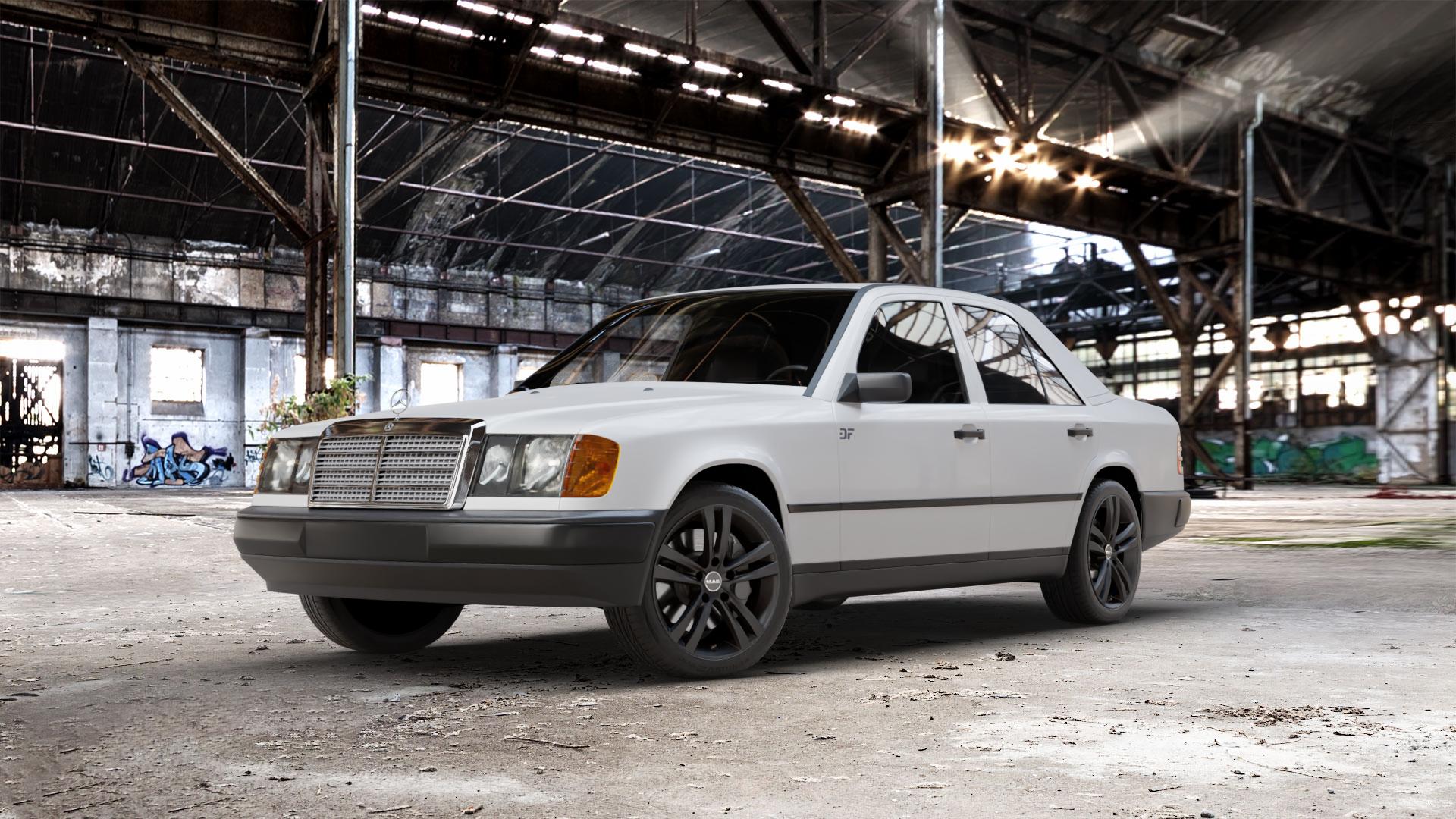MAK Zenith Gloss Black Felge mit Reifen schwarz in 17Zoll Winterfelge Alufelge auf weissem Mercedes E-Klasse Typ W124 Limousine ⬇️ mit 15mm Tieferlegung ⬇️ Old Industrial Hall_max_5300mm_2024 Frontansicht_1