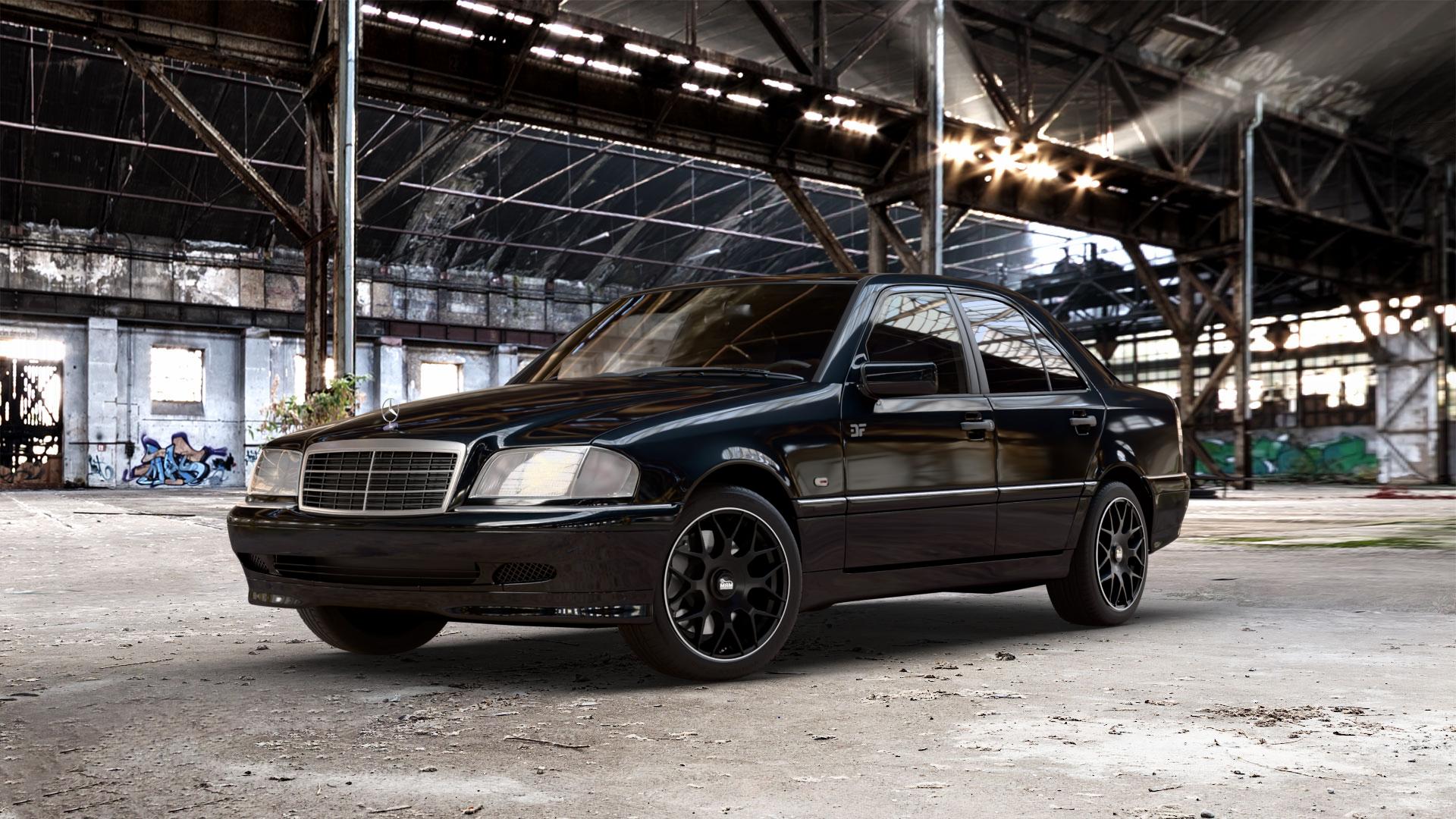 MAM GT1 MATT BLACK LIP POLISH Felge mit Reifen schwarz in 17Zoll Winterfelge Alufelge auf metallic schwarzem Mercedes C-Klasse Typ W202 Limousine ⬇️ mit 15mm Tieferlegung ⬇️ Old Industrial Hall_max_5300mm_2024 Frontansicht_1