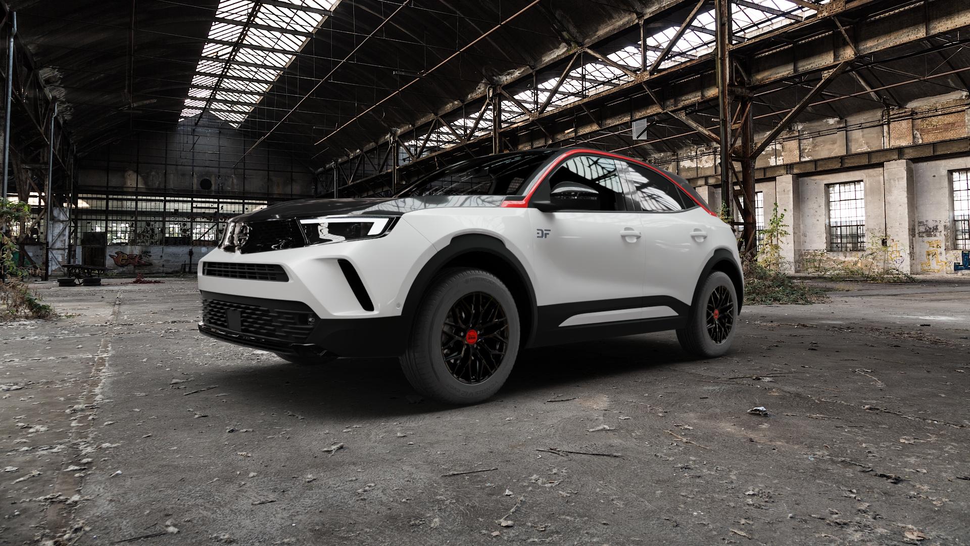 MAM RS4 BLACK PAINTED Felge mit Reifen schwarz in 16Zoll Winterfelge Alufelge auf weissem Opel Mokka-e Typ U 0,0l 57kW (77 PS) ⬇️ mit 15mm Tieferlegung ⬇️ Old Industrial Hall_max5000mm_2022 Frontansicht_1