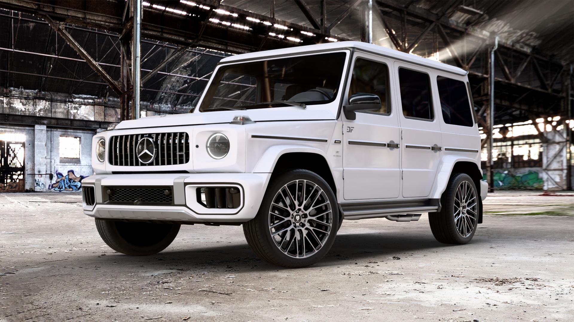 MB-DESIGN KV4 Glanzschwarz poliert Felge mit Reifen in 22Zoll Alufelge auf weissem Mercedes G-Klasse Typ W465 3,0l G 450d 270kW Mild-Hybrid (367 PS) 500 330kW (449 0,0l 580 EQ 223kW (303 4,0l 63 AMG 430kW (585 ⬇️ mit 15mm Tieferlegung ⬇️ Old Industrial Hall_max_5300mm_2024 Frontansicht_1