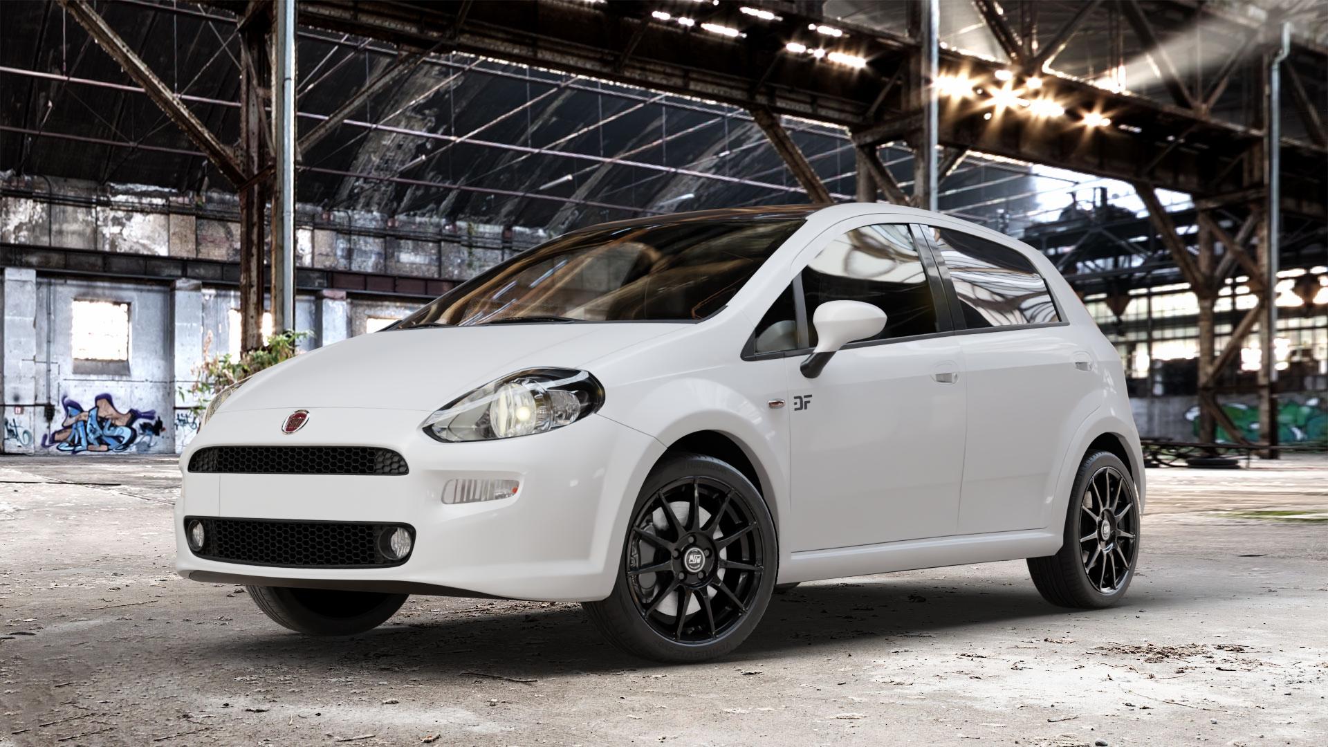 MSW 85 GLOSS BLACK Felge mit Reifen schwarz in 17Zoll Winterfelge Alufelge auf weissem Fiat Punto / Grande Typ 199 (12->) ⬇️ mit 15mm Tieferlegung ⬇️ Old Industrial Hall_max_4400mm_2024 Frontansicht_1
