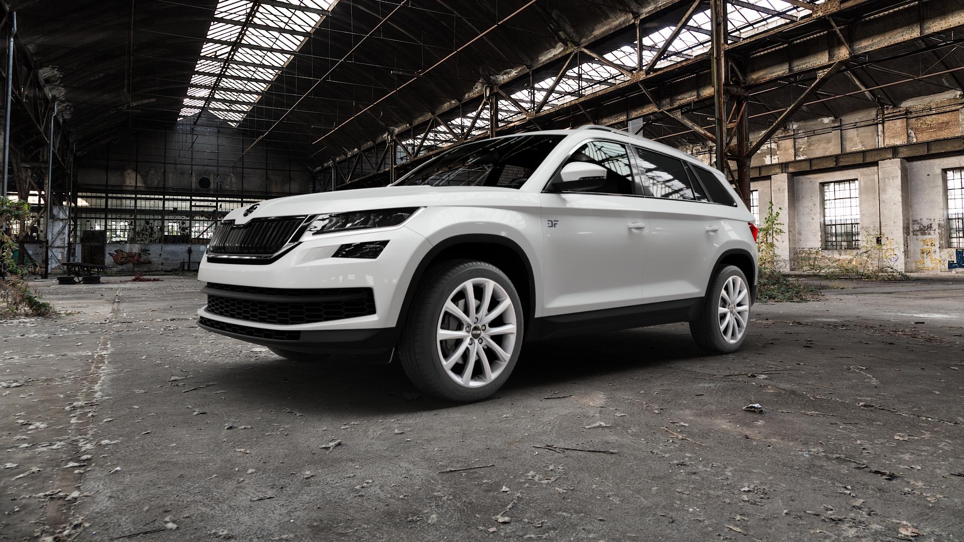 OXXO Liberty silver Felge mit Reifen silber in 19Zoll Winterfelge Alufelge auf weissem Skoda Kodiaq Typ NS ⬇️ mit 15mm Tieferlegung ⬇️ Old Industrial Hall_max5000mm_2022 Frontansicht_1