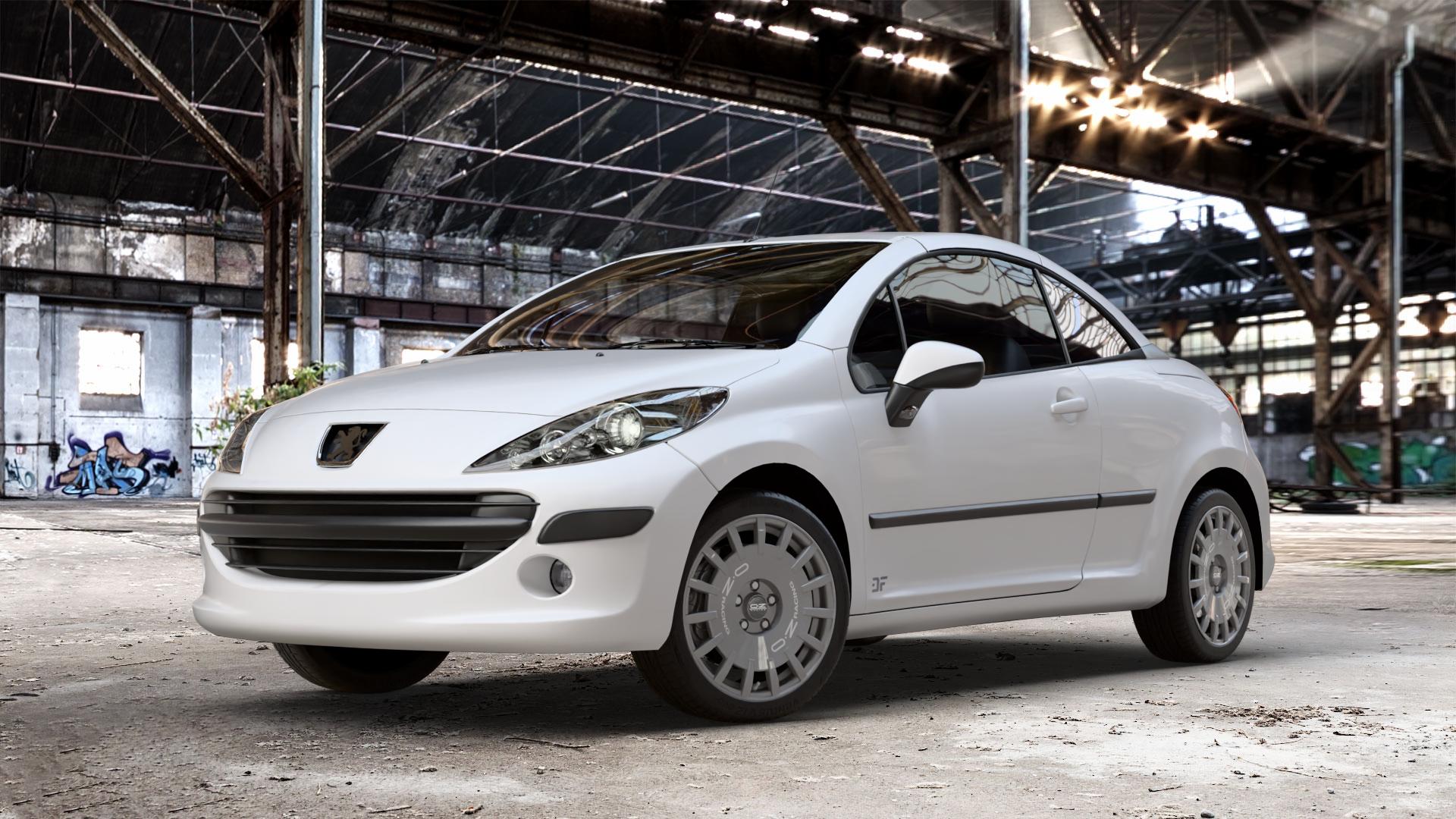 OZ RACING RALLY RACING DARK GRAPHITE SILVER LETTERING Felge mit Reifen grau silber in 17Zoll Winterfelge Alufelge auf weissem Peugeot 207 CC ⬇️ mit 15mm Tieferlegung ⬇️ Old Industrial Hall_max_4400mm_2024 Frontansicht_1