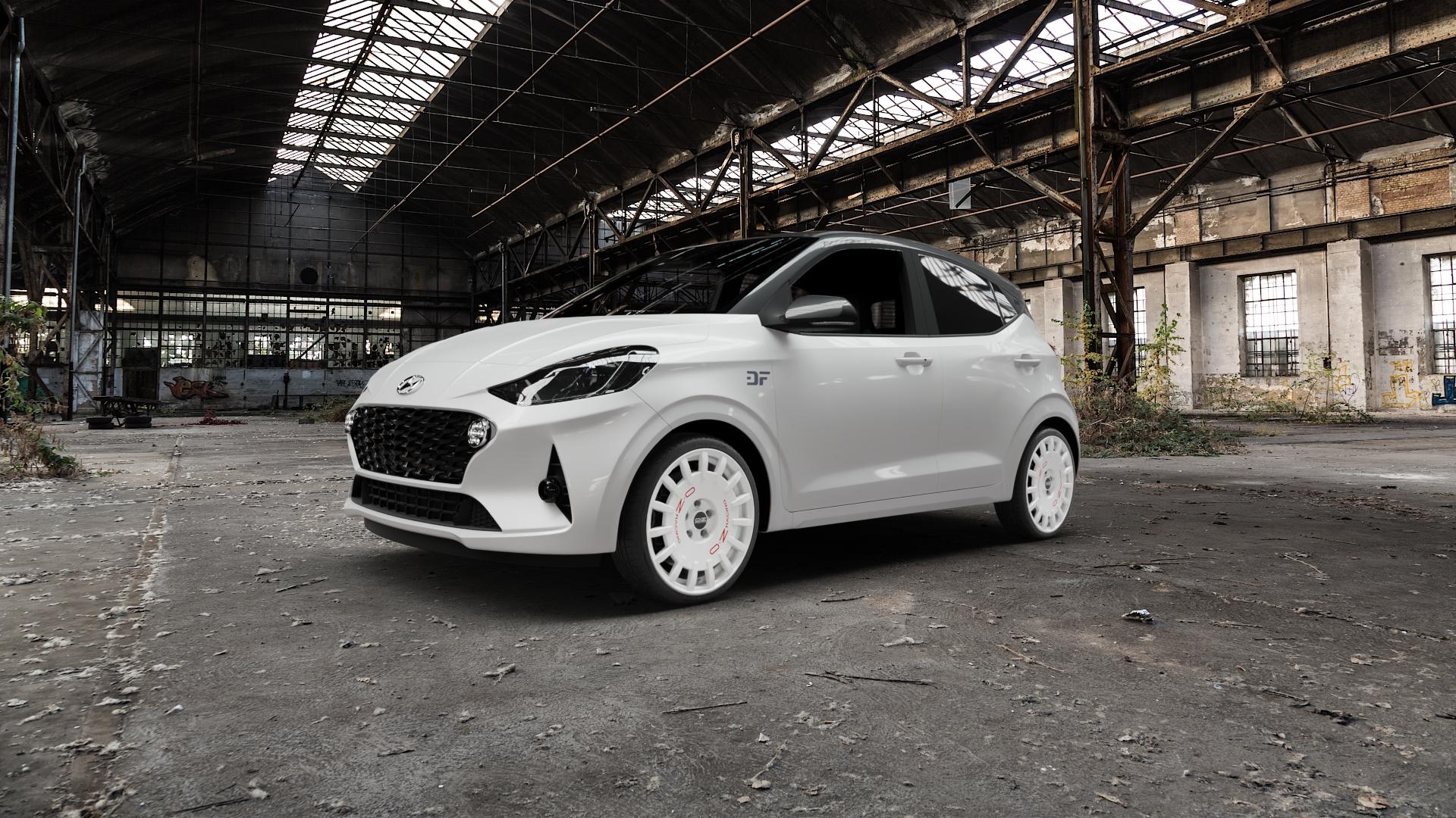 OZ RACING RALLY RACING RACE WHITE + RED LETTERING Felge mit Reifen rot weiss weiß in 17Zoll Winterfelge Alufelge auf weissem Hyundai i10 Typ AC3 ⬇️ mit 15mm Tieferlegung ⬇️ Old Industrial Hall_max5000mm_2022 Frontansicht_1