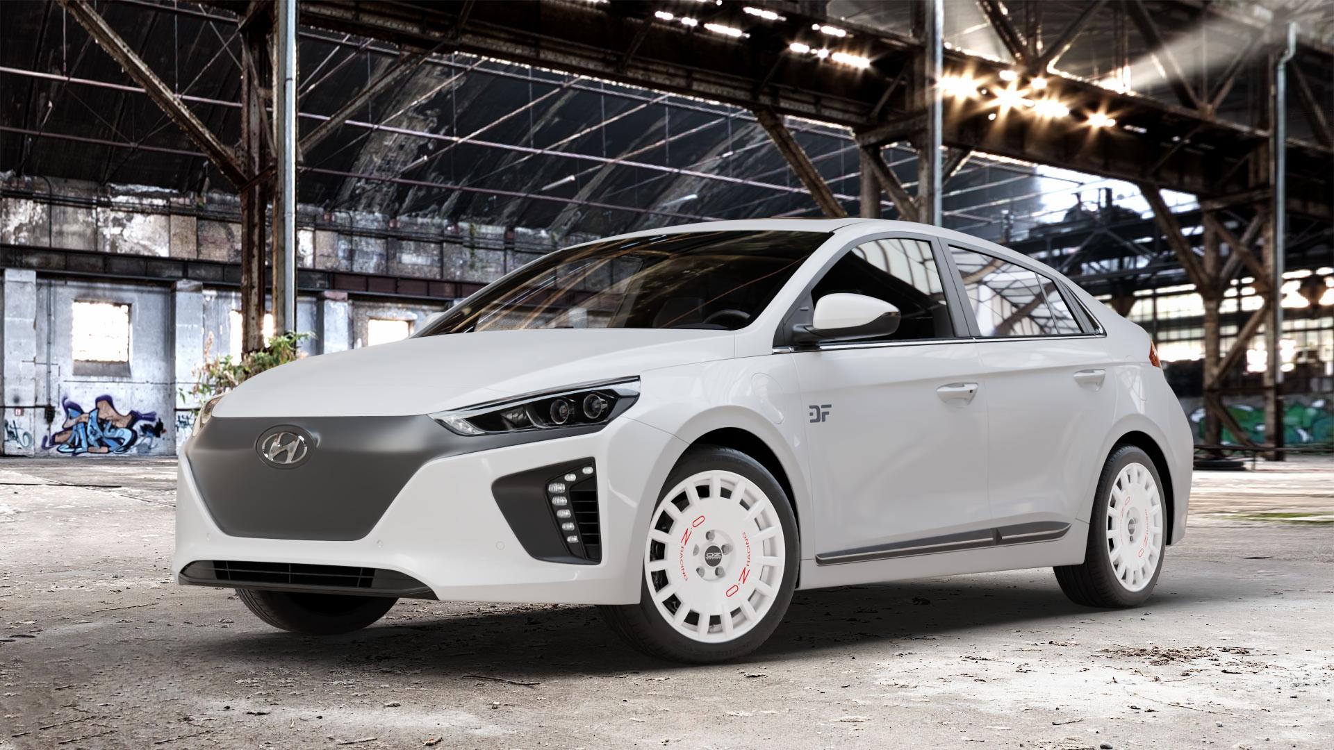 OZ RACING RALLY RACING RACE WHITE + RED LETTERING Felge mit Reifen rot weiss weiß in 17Zoll Winterfelge Alufelge auf weissem Hyundai Ioniq Typ AE ⬇️ mit 15mm Tieferlegung ⬇️ Old Industrial Hall_max_4400mm_2024 Frontansicht_1