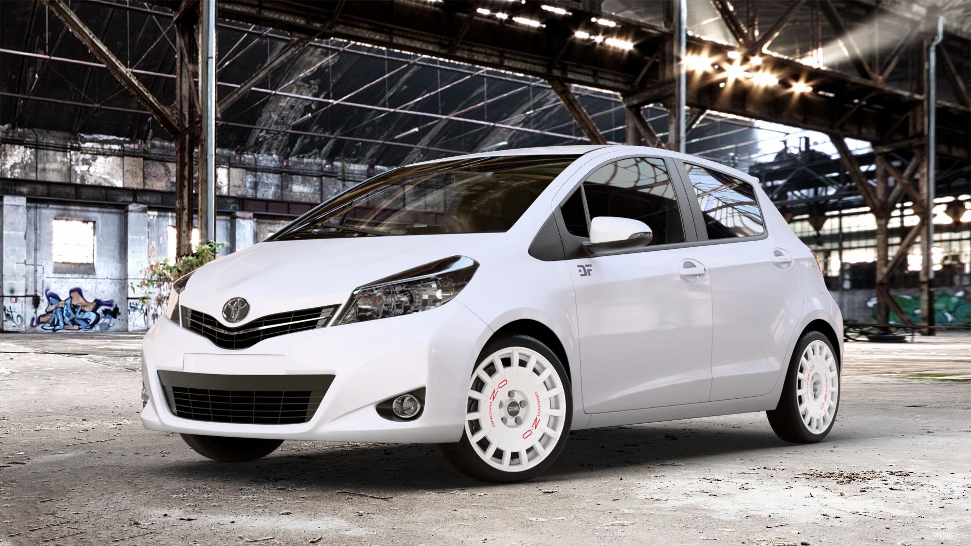 OZ RACING RALLY RACING RACE WHITE + RED LETTERING Felge mit Reifen rot weiss weiß in 17Zoll Winterfelge Alufelge auf weissem Toyota Yaris III Typ XP13 Facelift 17-> ⬇️ mit 15mm Tieferlegung ⬇️ Old Industrial Hall_max_4400mm_2024 Frontansicht_1