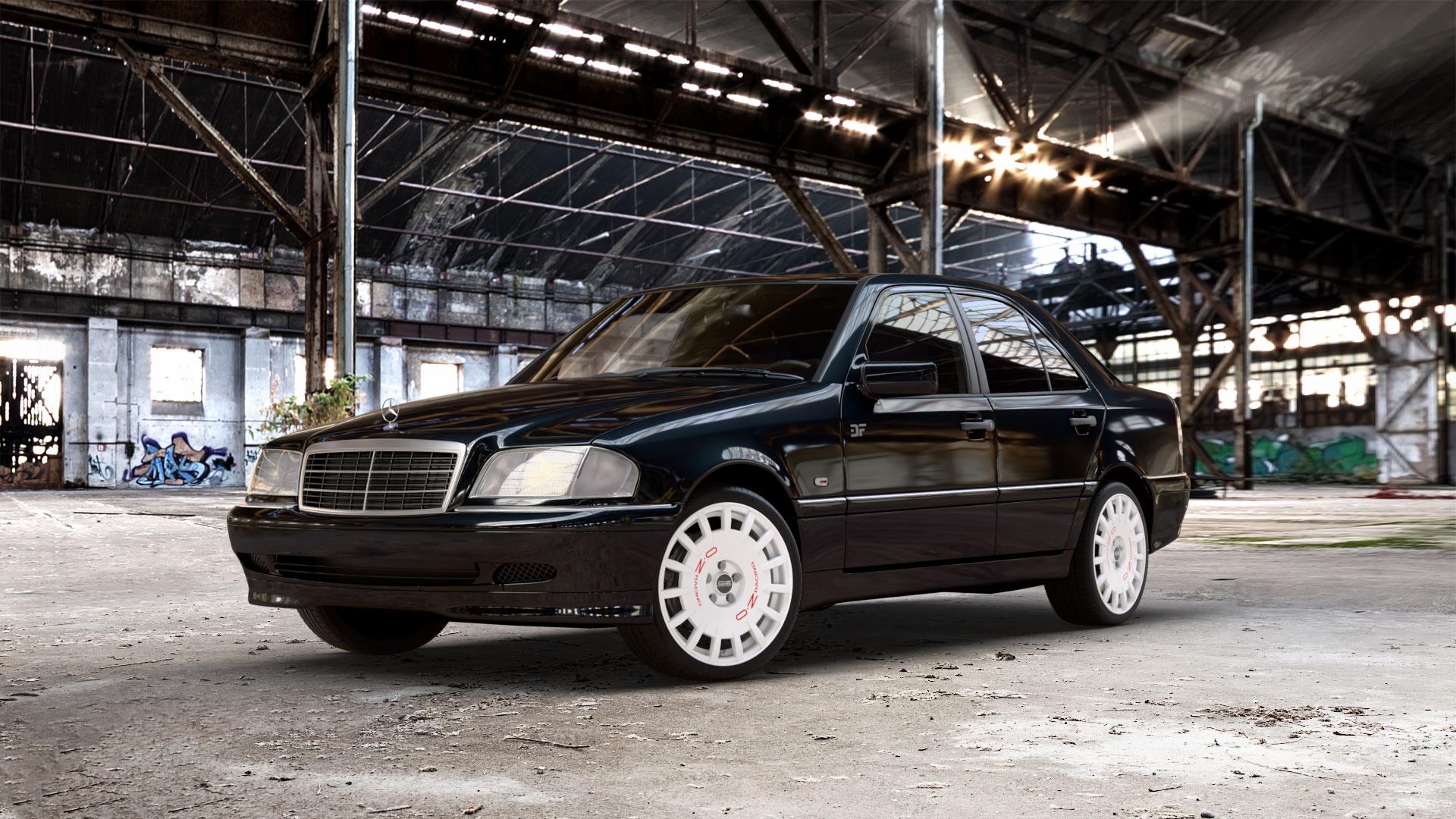 OZ RACING RALLY RACING RACE WHITE + RED LETTERING Felge mit Reifen rot weiss weiß in 18Zoll Winterfelge Alufelge auf metallic schwarzem Mercedes C-Klasse Typ W202 Limousine ⬇️ mit 15mm Tieferlegung ⬇️ Old Industrial Hall_max_5300mm_2024 Frontansicht_1