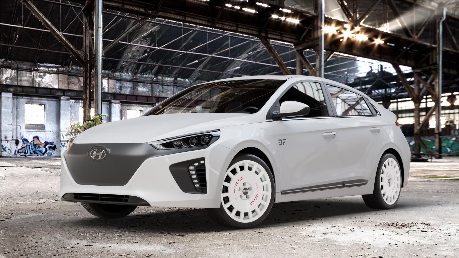 OZ RACING RALLY RACING RACE WHITE + RED LETTERING Felge mit Reifen rot weiss weiß in 18Zoll Winterfelge Alufelge auf weissem Hyundai Ioniq Typ AE ⬇️ mit 15mm Tieferlegung ⬇️ Old Industrial Hall_max_4400mm_2024 Frontansicht_1