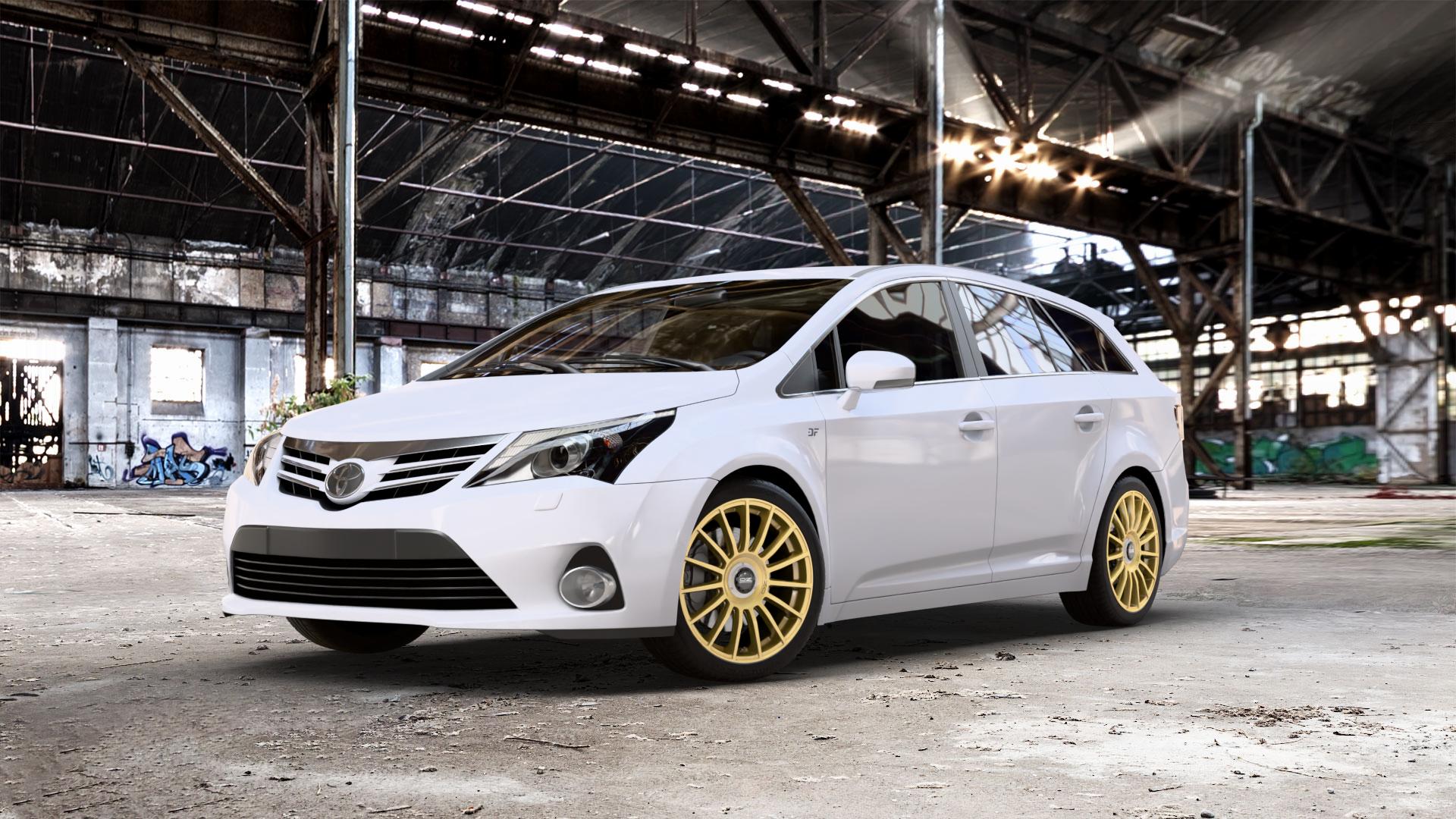 OZ RACING SUPERTURISMO EVOLUZIONE RACE GOLD + BLACK LETTERING Felge mit Reifen in 18Zoll Winterfelge Alufelge auf weissem Toyota Avensis Combi Typ T27 Facelift 12-> ⬇️ mit 15mm Tieferlegung ⬇️ Old Industrial Hall_max_5300mm_2024 Frontansicht_1