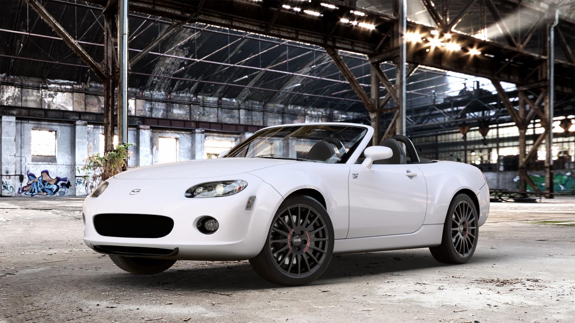 OZ RACING SUPERTURISMO GT MATT BLACK Felge mit Reifen schwarz schwarz matt in 17Zoll Winterfelge Alufelge auf weissem Mazda MX-5 III (NC) ⬇️ mit 15mm Tieferlegung ⬇️ Old Industrial Hall_max_4400mm_2024 Frontansicht_1