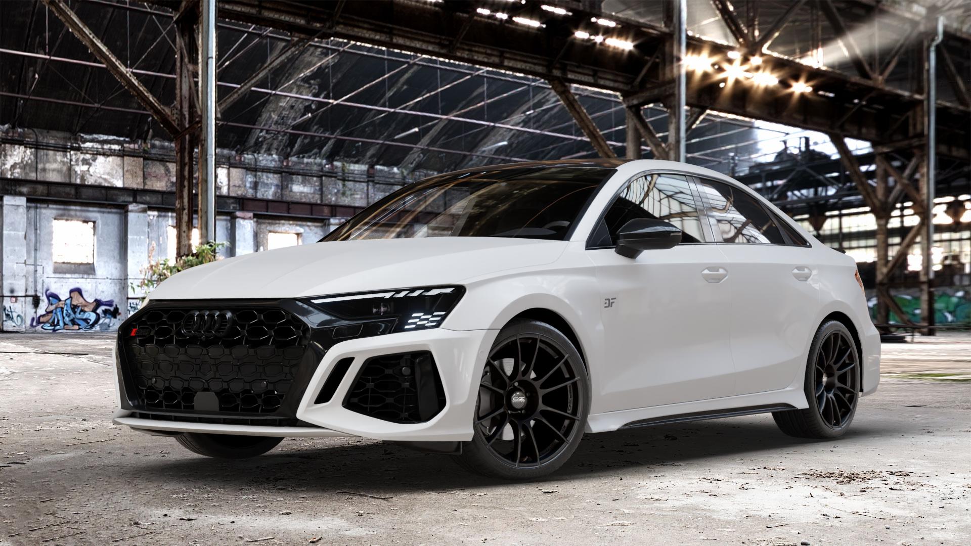 OZ RACING ULTRALEGGERA HLT MATT BLACK Felge mit Reifen schwarz schwarz matt in 19Zoll Winterfelge Alufelge auf weissem Audi A3 Typ GY (Limousine) 2,5l TFSI quattro 294kW RS3 (400 PS) 299kW (407 ⬇️ mit 15mm Tieferlegung ⬇️ Old Industrial Hall_max_4400mm_2024 Frontansicht_1