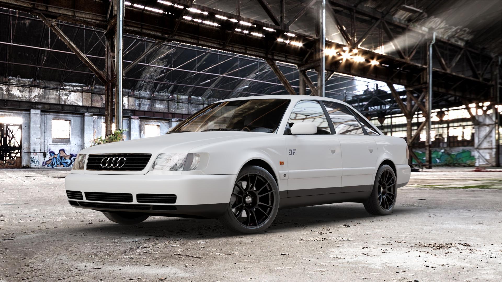 OZ RACING ULTRALEGGERA MATT BLACK Felge mit Reifen schwarz schwarz matt in 18Zoll Winterfelge Alufelge auf weissem Audi 100 Typ C4 (Limousine) A6 4A/C4 ⬇️ mit 15mm Tieferlegung ⬇️ Old Industrial Hall_max_5300mm_2024 Frontansicht_1
