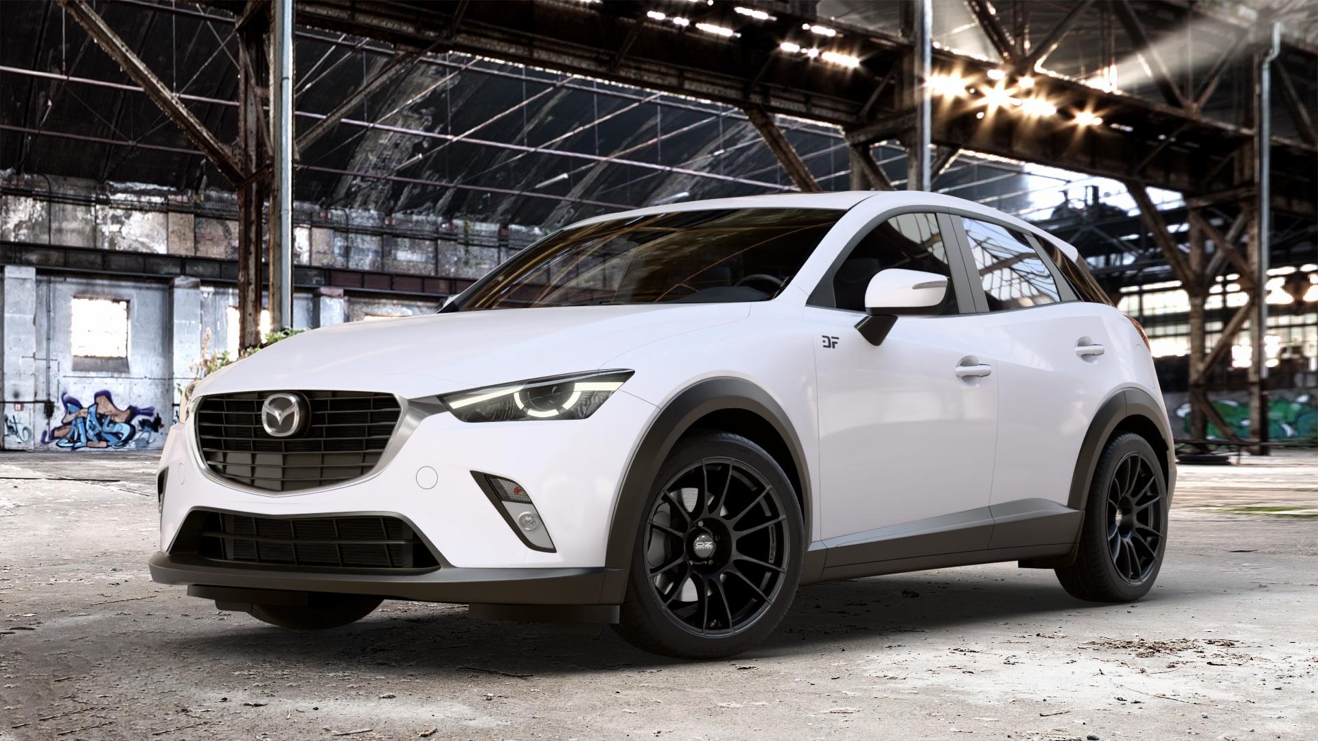 OZ RACING ULTRALEGGERA MATT BLACK Felge mit Reifen schwarz schwarz matt in 18Zoll Winterfelge Alufelge auf weissem Mazda CX-3 Typ DJ1 Facelift ⬇️ mit 15mm Tieferlegung ⬇️ Old Industrial Hall_max_4400mm_2024 Frontansicht_1
