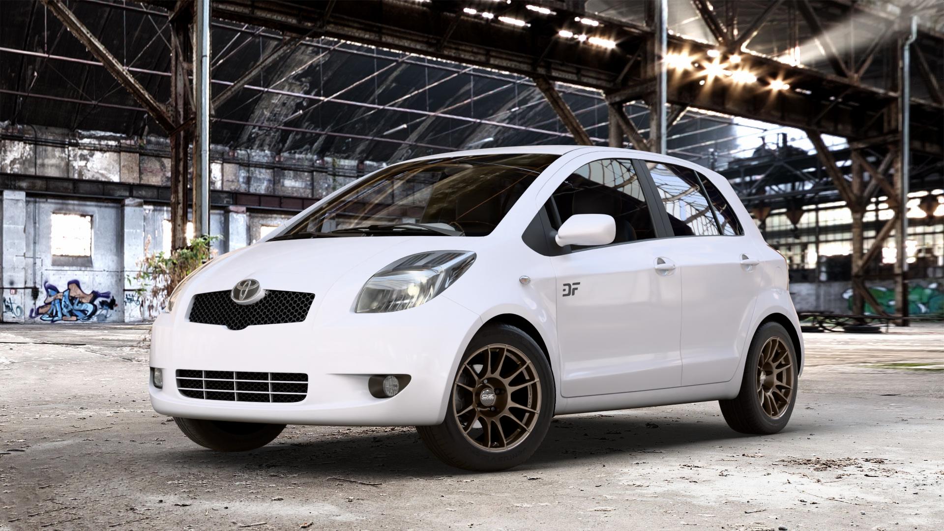 OZ RACING ULTRALEGGERA MATT BRONZE Felge mit Reifen in 15Zoll Winterfelge Alufelge auf weissem Toyota Yaris II Typ XP9F ⬇️ mit 15mm Tieferlegung ⬇️ Old Industrial Hall_max_4400mm_2024 Frontansicht_1