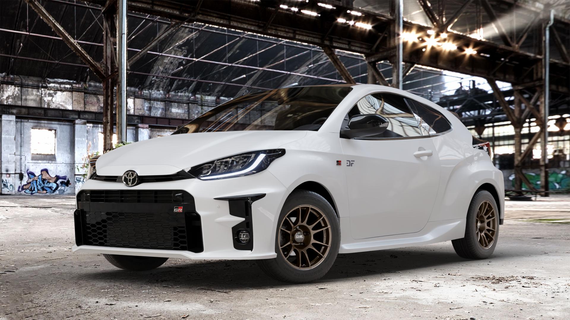 OZ RACING ULTRALEGGERA MATT BRONZE Felge mit Reifen in 15Zoll Winterfelge Alufelge auf weissem Toyota Yaris IV Typ XPA1F(EU,M) l kW (0 PS) GR XPA1G(EU,M) ⬇️ mit 15mm Tieferlegung ⬇️ Old Industrial Hall_max_4400mm_2024 Frontansicht_1
