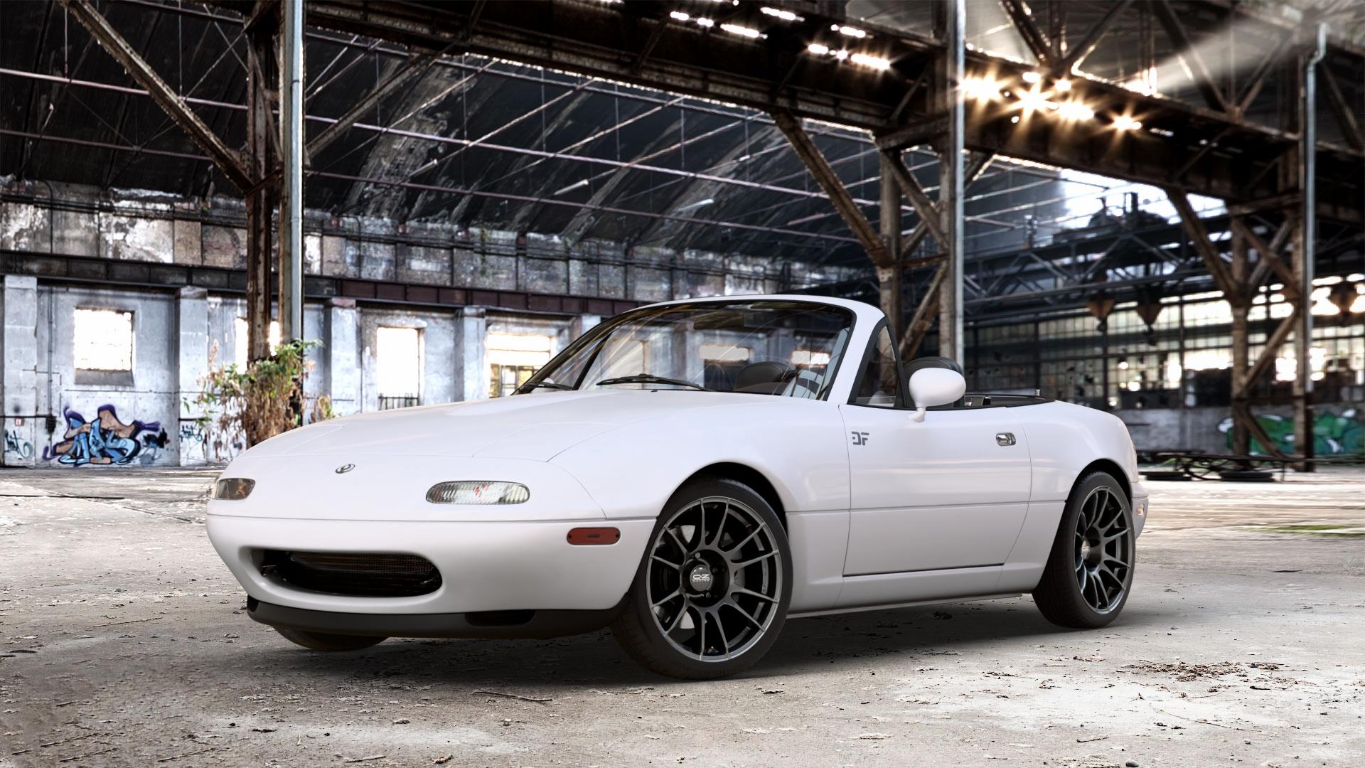 OZ RACING ULTRALEGGERA MATT GRAPHITE Felge mit Reifen grau anthrazit grau/silber in 16Zoll Winterfelge Alufelge auf weissem Mazda MX-5 I (NA) ⬇️ mit 15mm Tieferlegung ⬇️ Old Industrial Hall_max_4400mm_2024 Frontansicht_1