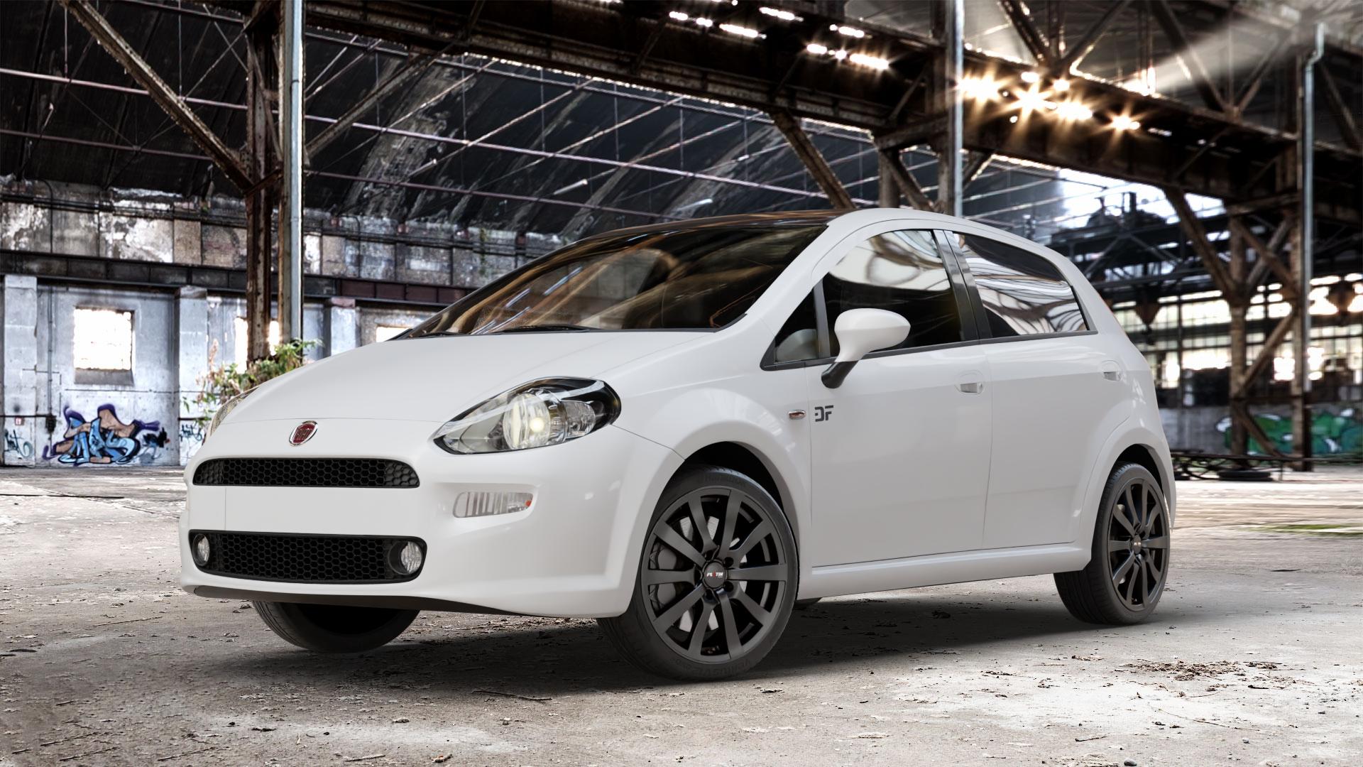 Platin Wheels P 58 matt black Felge mit Reifen schwarz schwarz matt in 17Zoll Winterfelge Alufelge auf weissem Fiat Punto / Grande Typ 199 (12->) ⬇️ mit 15mm Tieferlegung ⬇️ Old Industrial Hall_max_4400mm_2024 Frontansicht_1