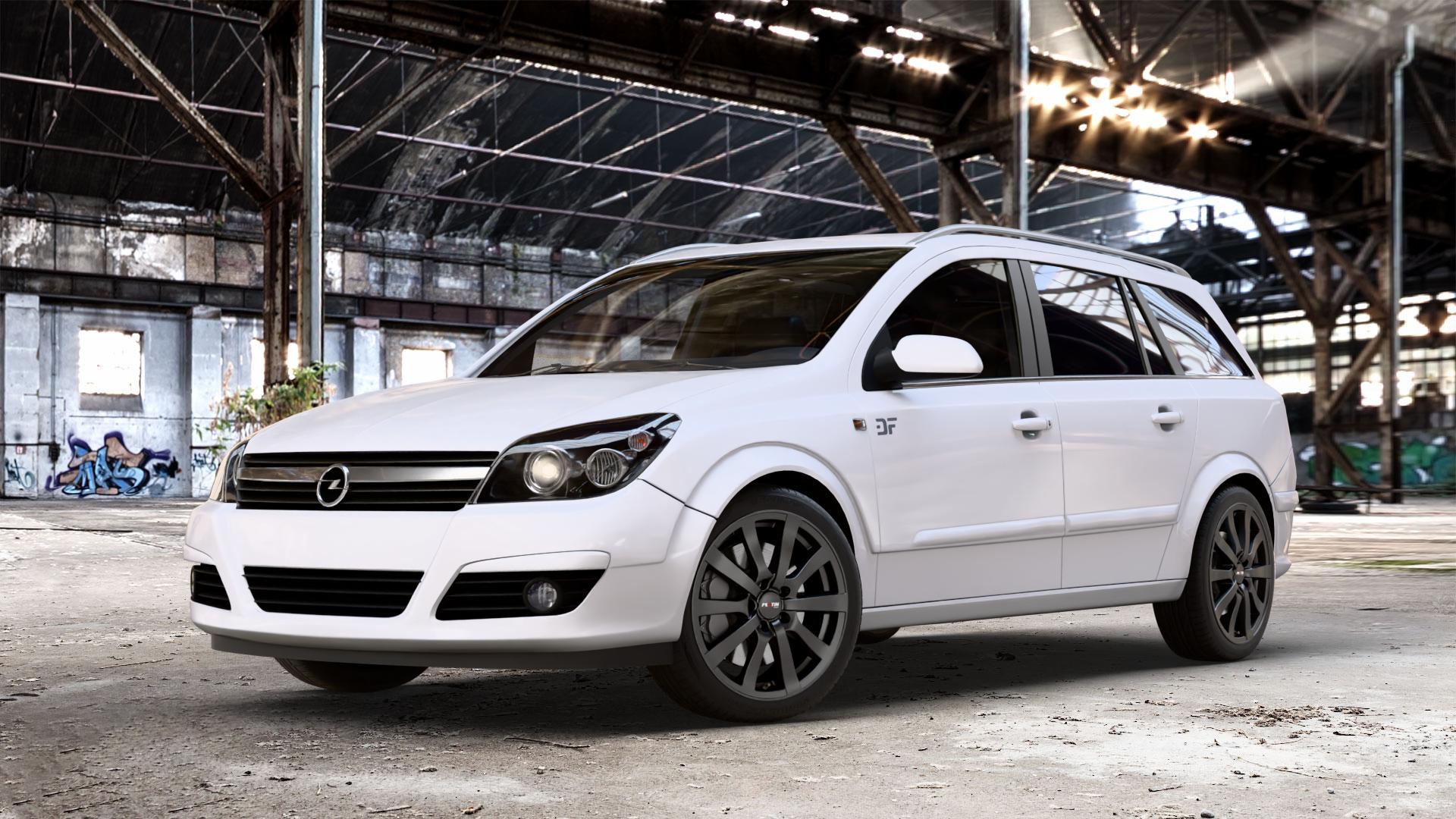 Platin Wheels P 58 matt black Felge mit Reifen schwarz schwarz matt in 17Zoll Winterfelge Alufelge auf weissem Opel Astra H Typ A-H Caravan A-H/SW ⬇️ mit 15mm Tieferlegung ⬇️ Old Industrial Hall_max_4400mm_2024 Frontansicht_1