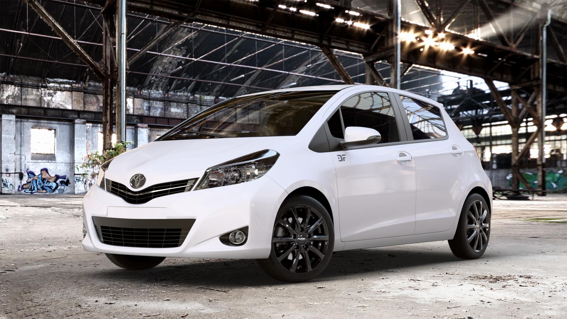Platin Wheels P 69 black shiny Felge mit Reifen schwarz in 16Zoll Winterfelge Alufelge auf weissem Toyota Yaris III Typ XP13 Facelift 17-> ⬇️ mit 15mm Tieferlegung ⬇️ Old Industrial Hall_max_4400mm_2024 Frontansicht_1