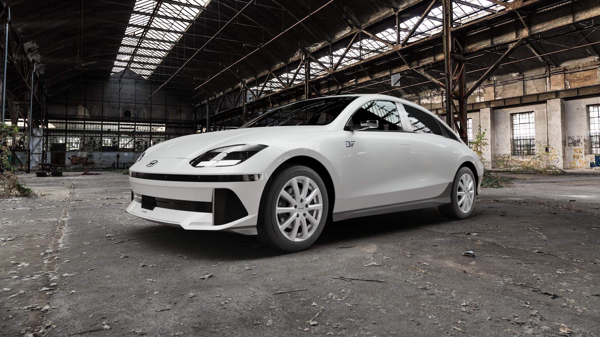 Platin Wheels P 69 polarsilber Felge mit Reifen in 18Zoll Winterfelge Alufelge auf weissem Hyundai Ioniq 6 Typ CE ⬇️ mit 15mm Tieferlegung ⬇️ Old Industrial Hall_max5000mm_2022 Frontansicht_1