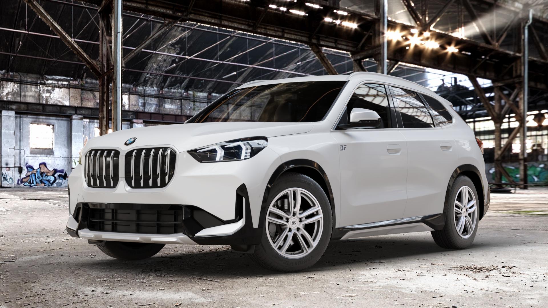 RC Design RC27 kristallsilber lackiert Felge mit Reifen in 17Zoll Winterfelge Alufelge auf weissem BMW X1 Typ U11 (U1X) ⬇️ mit 15mm Tieferlegung ⬇️ Old Industrial Hall_max_4400mm_2024 Frontansicht_1