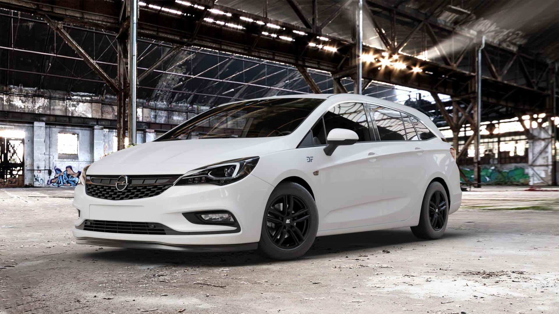 RC Design RC27 schwarz-matt lackiert Felge mit Reifen in 16Zoll Winterfelge Alufelge auf weissem Opel Astra K Sports Tourer Typ B-K ⬇️ mit 15mm Tieferlegung ⬇️ Old Industrial Hall_max_5300mm_2024 Frontansicht_1