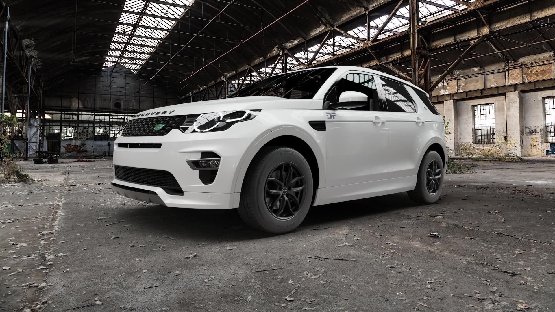 RIAL Lucca diamant-schwarz Felge mit Reifen in 17Zoll Winterfelge Alufelge auf weissem Land Rover Discovery Sport Typ LC Facelift ⬇️ mit 15mm Tieferlegung ⬇️ Old Industrial Hall_max5000mm_2022 Frontansicht_1