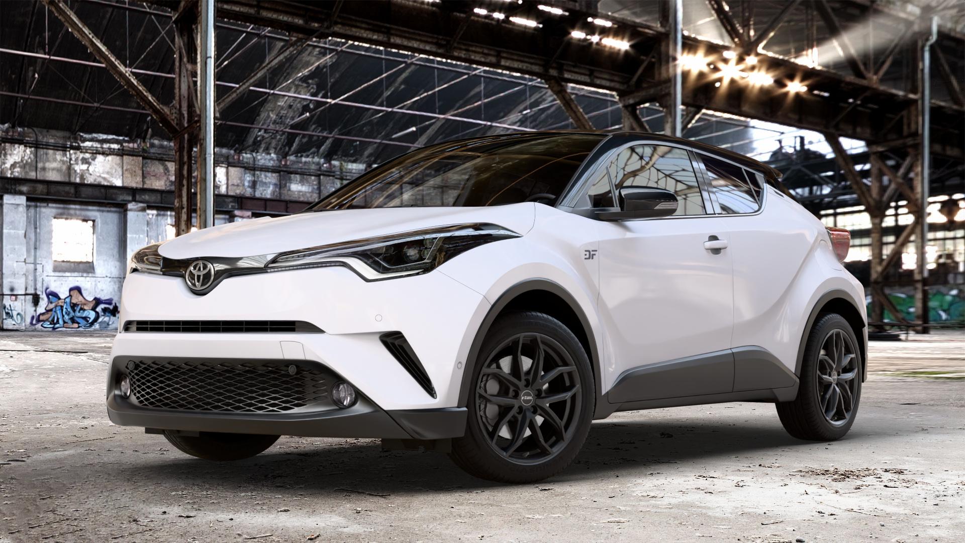 RIAL Lucca diamant-schwarz Felge mit Reifen in 18Zoll Winterfelge Alufelge auf weissem Toyota C-HR Typ AX1T(EU,M) AX1T(EU,M)-TMG ⬇️ mit 15mm Tieferlegung ⬇️ Old Industrial Hall_max_4400mm_2024 Frontansicht_1