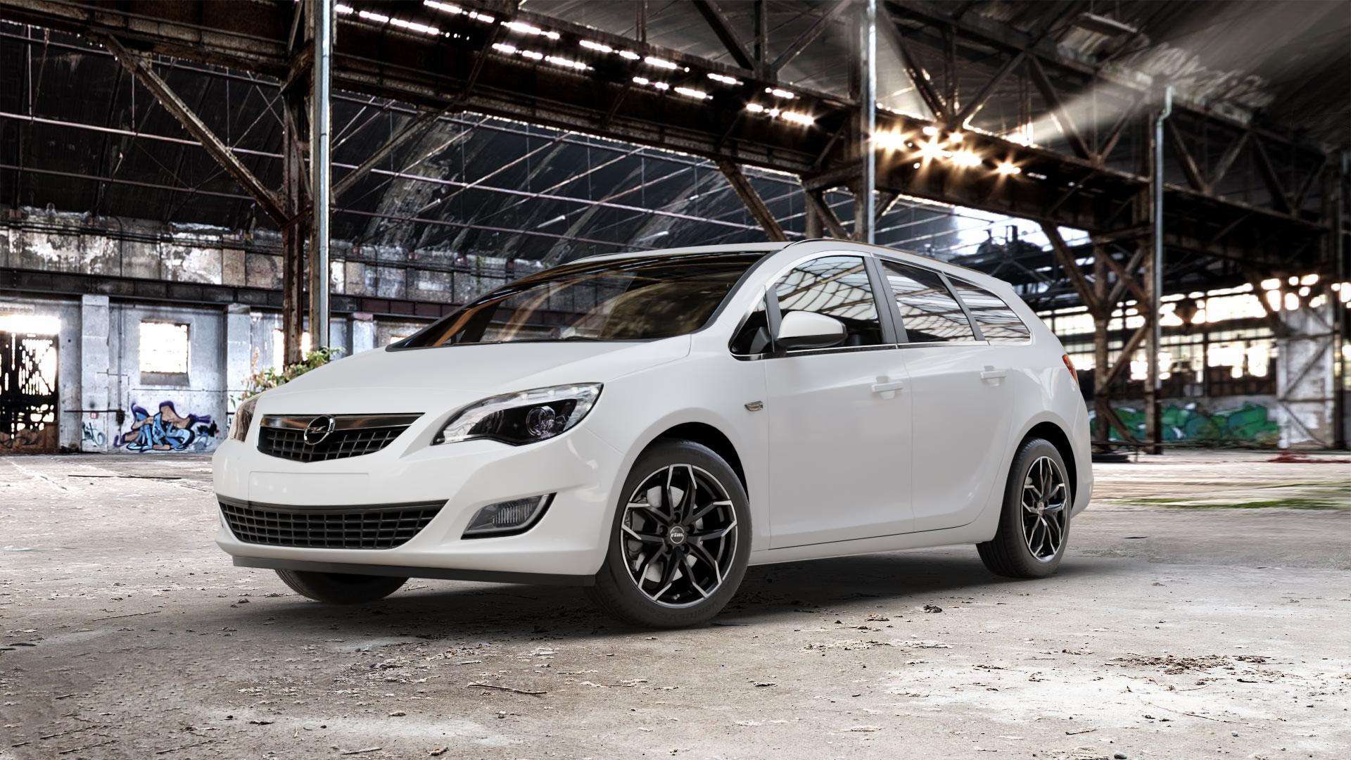 RIAL Lucca diamant-schwarz frontpoliert Felge mit Reifen silber mehrfarbig in 17Zoll Winterfelge Alufelge auf weissem Opel Astra J Sports Tourer Typ P-J/SW Facelift ⬇️ mit 15mm Tieferlegung ⬇️ Old Industrial Hall_max_5300mm_2024 Frontansicht_1