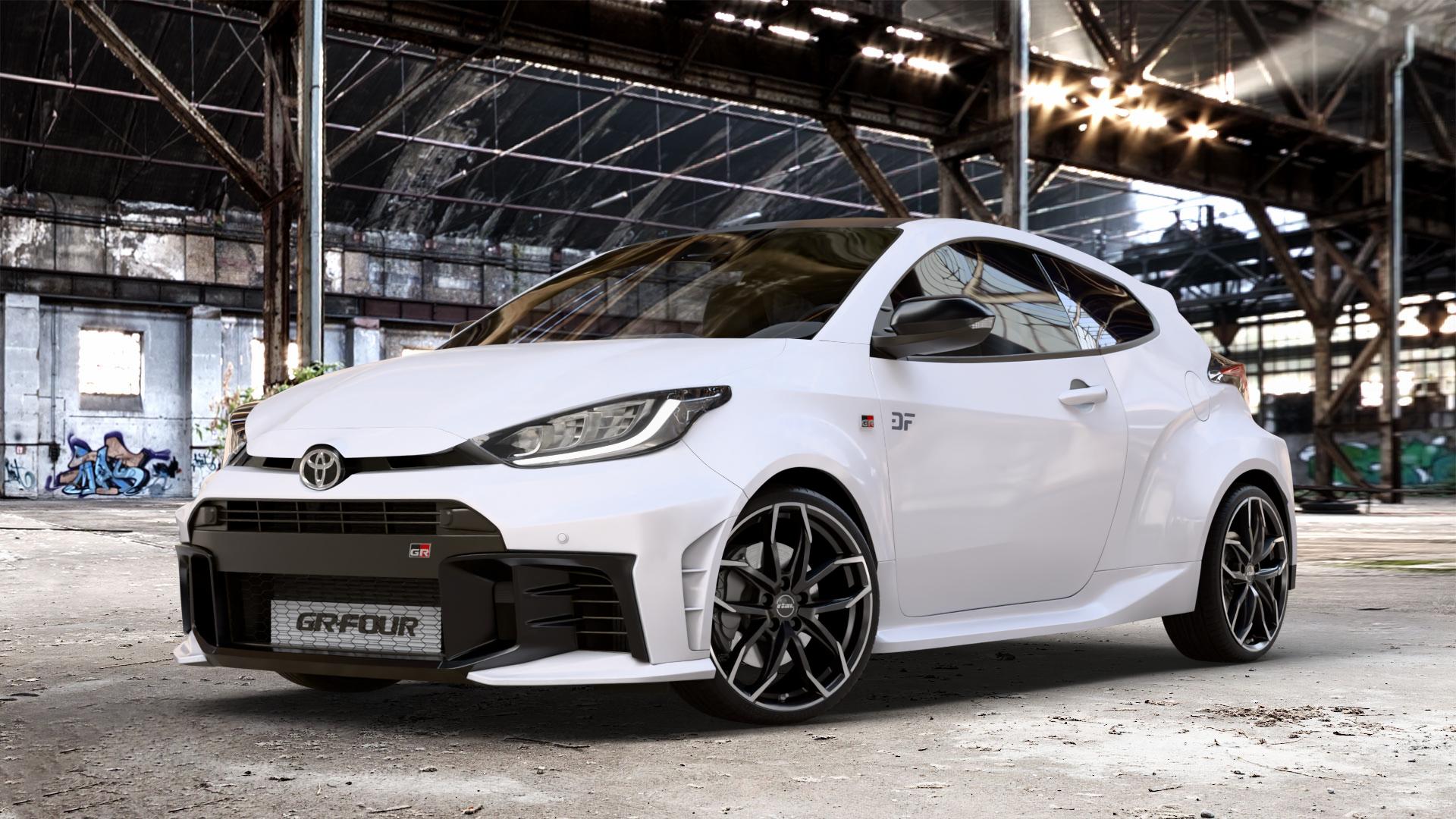 RIAL Lucca diamant-schwarz frontpoliert Felge mit Reifen silber mehrfarbig in 19Zoll Winterfelge Alufelge auf weissem Toyota Yaris IV GR Typ XPA1G(EU,M) Facelift ⬇️ mit 15mm Tieferlegung ⬇️ Old Industrial Hall_max_4400mm_2024 Frontansicht_1