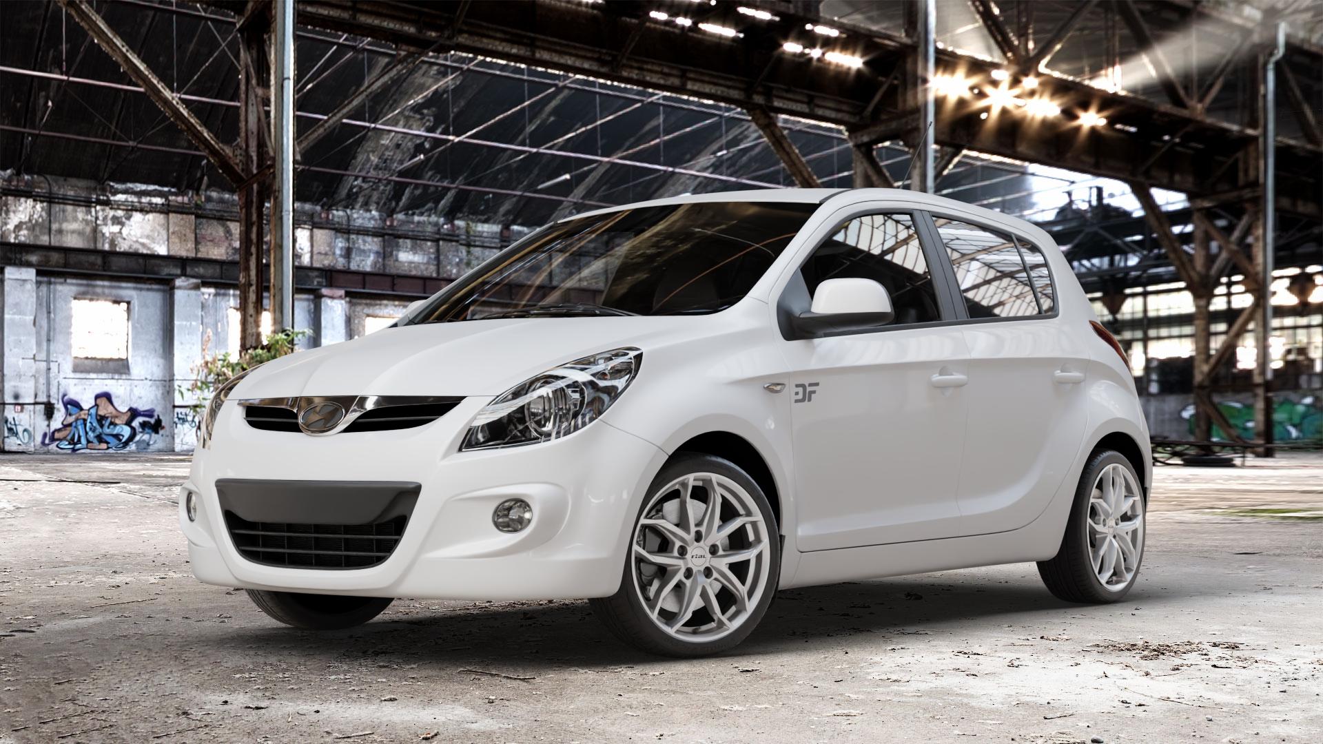 RIAL Lucca polar-silber Felge mit Reifen in 17Zoll Winterfelge Alufelge auf weissem Hyundai i20 Typ PB, PBT (08-12) ⬇️ mit 15mm Tieferlegung ⬇️ Old Industrial Hall_max_4400mm_2024 Frontansicht_1