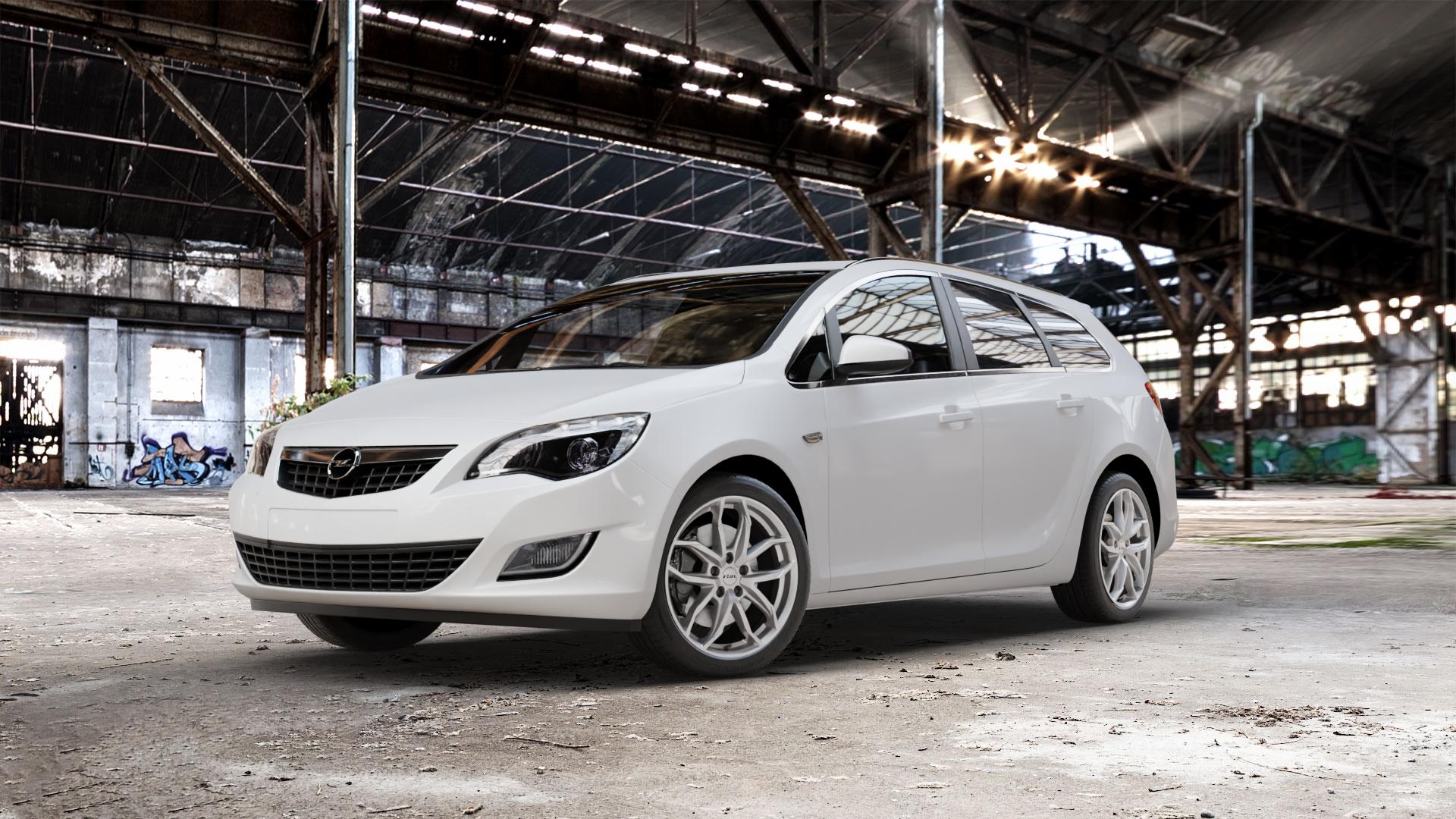 RIAL Lucca polar-silber Felge mit Reifen in 18Zoll Winterfelge Alufelge auf weissem Opel Astra J Sports Tourer Typ P-J/SW Facelift ⬇️ mit 15mm Tieferlegung ⬇️ Old Industrial Hall_max_5300mm_2024 Frontansicht_1