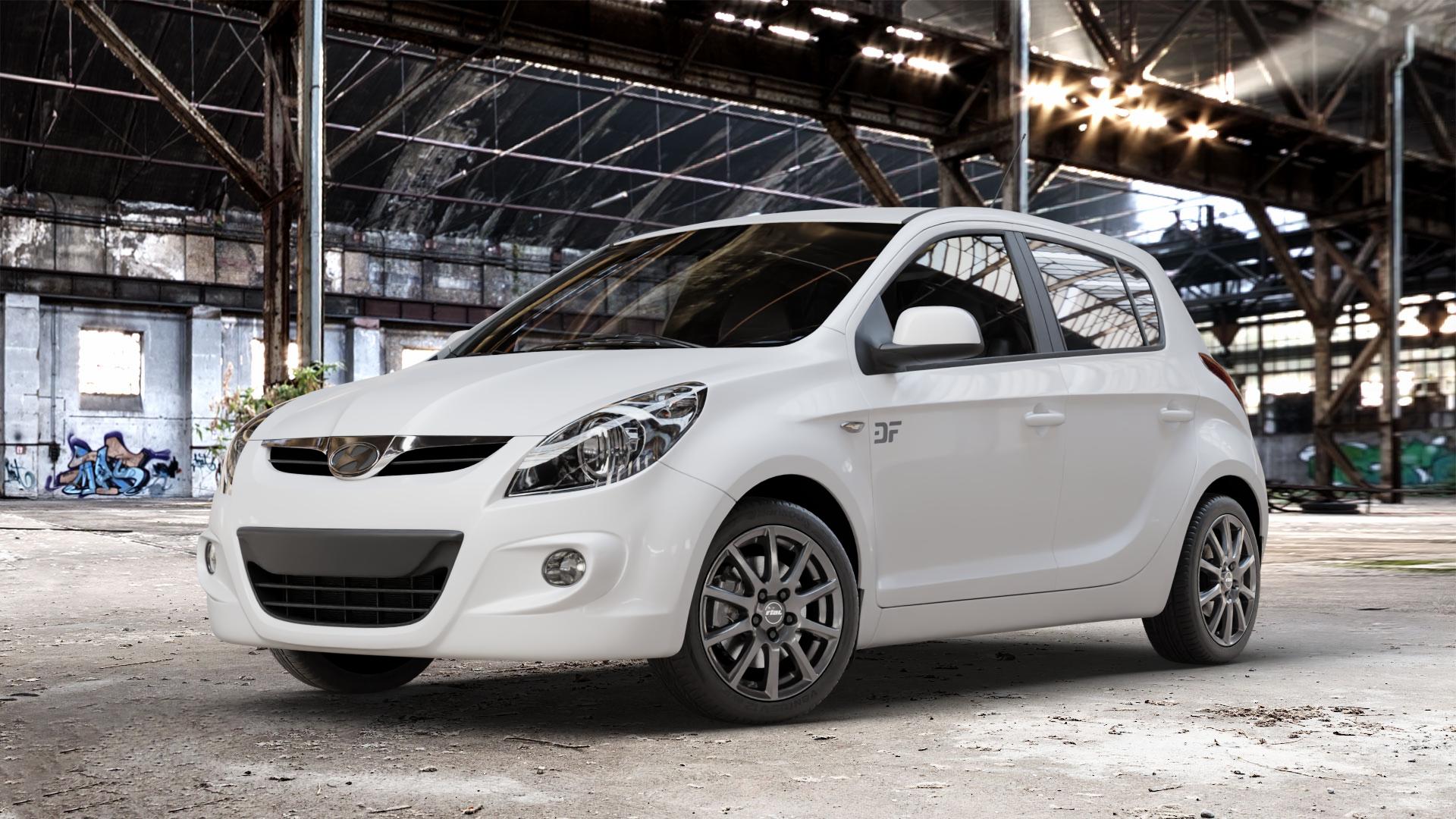 RIAL Milano titanium Felge mit Reifen grau in 16Zoll Winterfelge Alufelge auf weissem Hyundai i20 Typ PB, PBT (08-12) ⬇️ mit 15mm Tieferlegung ⬇️ Old Industrial Hall_max_4400mm_2024 Frontansicht_1