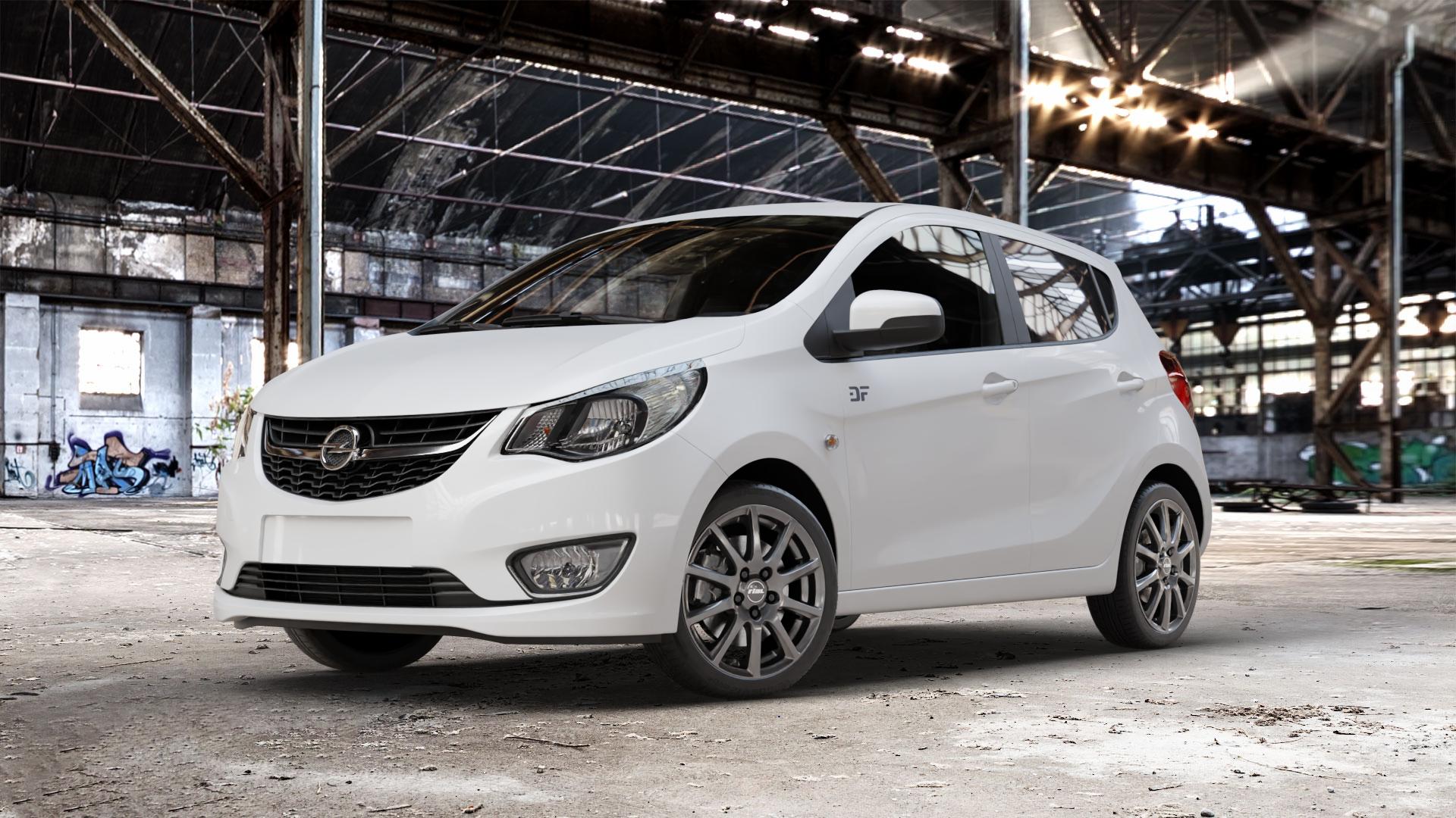 RIAL Milano titanium Felge mit Reifen grau in 16Zoll Winterfelge Alufelge auf weissem Opel Karl Typ D-A ⬇️ mit 15mm Tieferlegung ⬇️ Old Industrial Hall_max_4400mm_2024 Frontansicht_1
