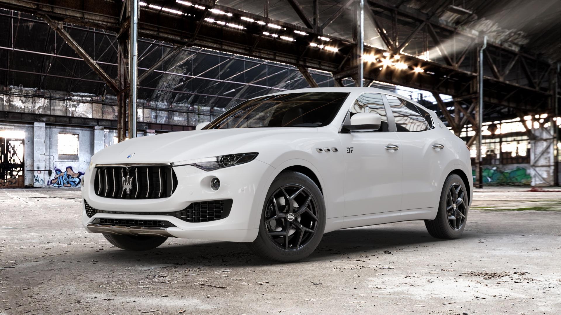 RIAL Salento diamant-schwarz Felge mit Reifen in 19Zoll Winterfelge Alufelge auf weissem Maserati Levante Typ M156 ⬇️ mit 15mm Tieferlegung ⬇️ Old Industrial Hall_max_5300mm_2024 Frontansicht_1