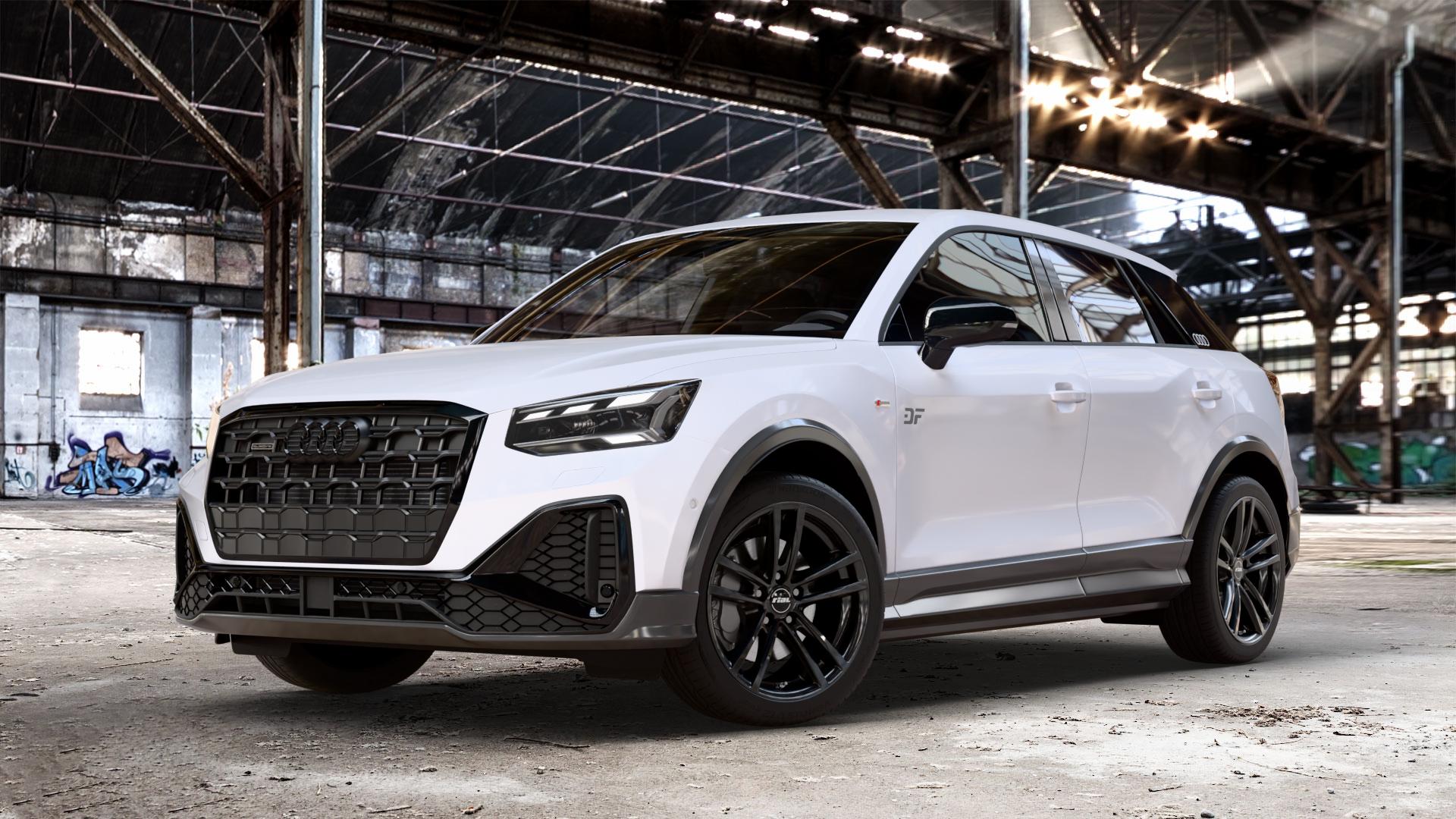 RIAL X10 racing-schwarz Felge mit Reifen in 18Zoll Winterfelge Alufelge auf weißem Audi Q2 Typ GA Facelift ⬇️ mit 15mm Tieferlegung ⬇️ Old Industrial Hall_max_4400mm_2024 Frontansicht_1