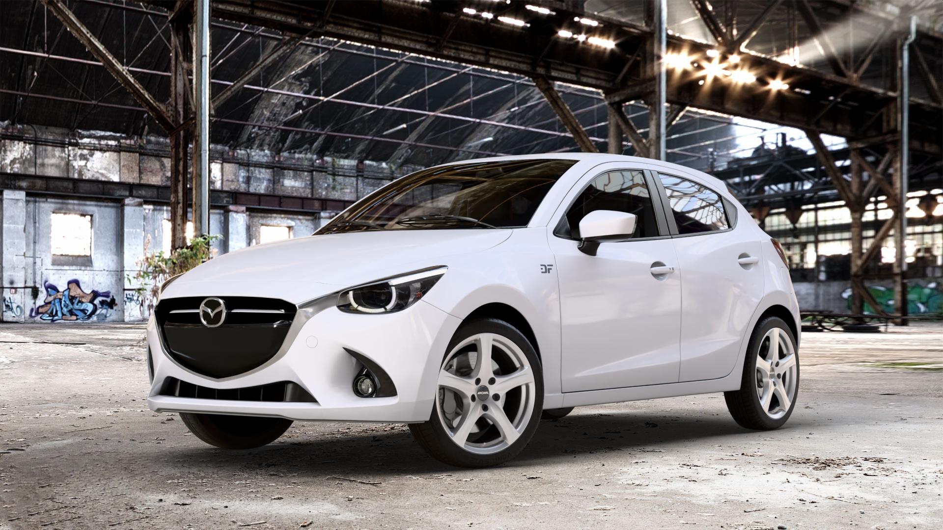 RONAL R42 KRISTALLSILBER Felge mit Reifen in 17Zoll Winterfelge Alufelge auf weissem Mazda 2 (15-) (DJ) 1,5l SKYACTIV-G 75 55kW (75 PS) 90 66kW (90 115 85kW (116 SKYACTIV-D 105 77kW (105 (20-) Facelift ⬇️ mit 15mm Tieferlegung ⬇️ Old Industrial Hall_max_4400mm_2024 Frontansicht_1