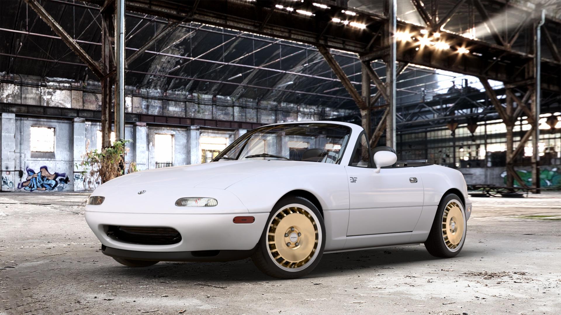 RONAL R50 AERO RACING GOLD HORNKOPIERT Felge mit Reifen silber mehrfarbig in 16Zoll Winterfelge Alufelge auf weissem Mazda MX-5 I (NA) ⬇️ mit 15mm Tieferlegung ⬇️ Old Industrial Hall_max_4400mm_2024 Frontansicht_1