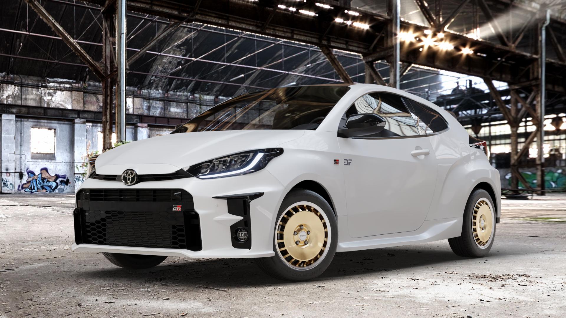 RONAL R50 AERO RACING GOLD HORNKOPIERT Felge mit Reifen silber mehrfarbig in 16Zoll Winterfelge Alufelge auf weissem Toyota Yaris IV Typ XPA1F(EU,M) l kW (0 PS) GR XPA1G(EU,M) ⬇️ mit 15mm Tieferlegung ⬇️ Old Industrial Hall_max_4400mm_2024 Frontansicht_1