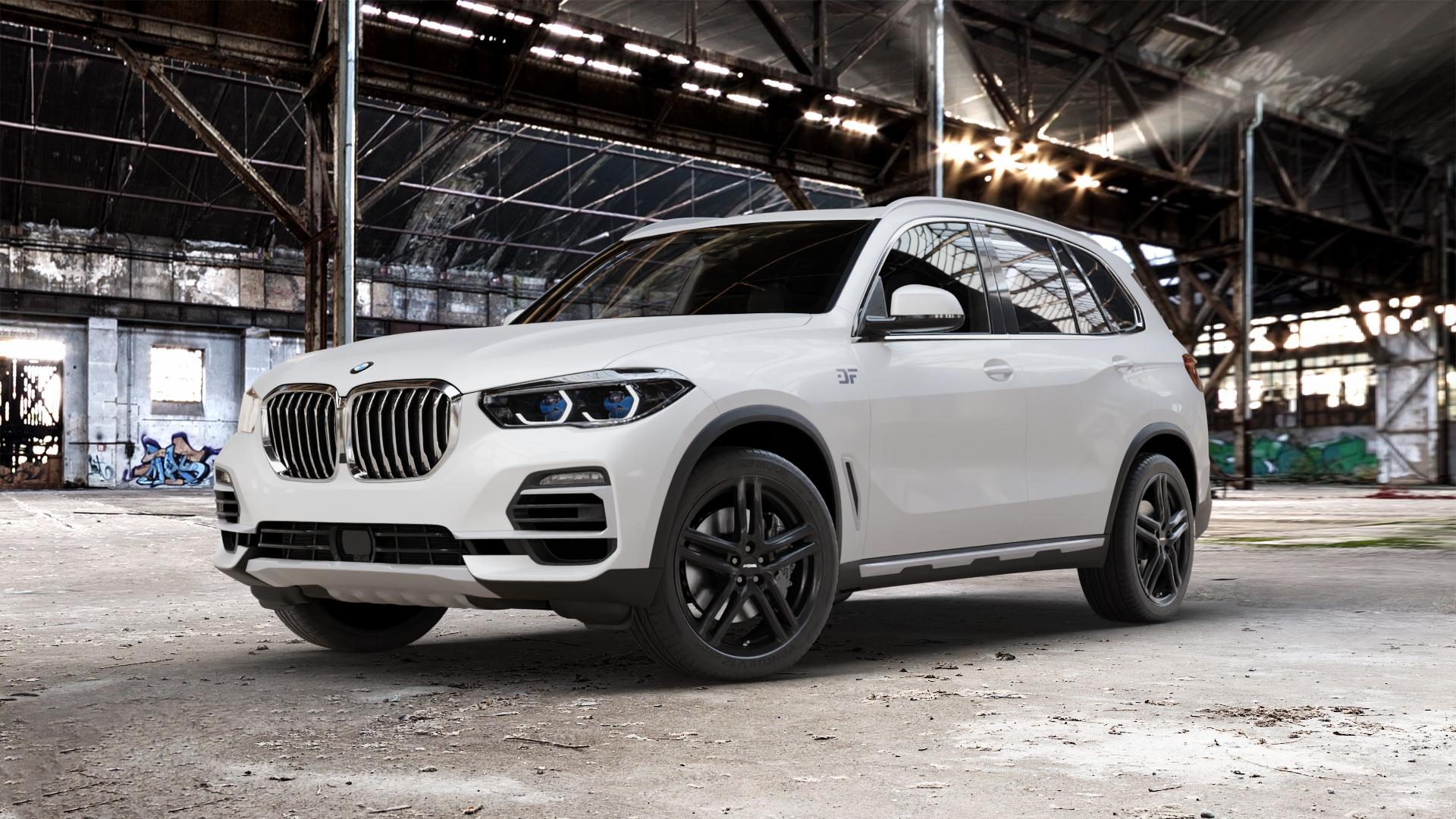 RONAL R65 JETBLACK MATT Felge mit Reifen schwarz in 20Zoll Winterfelge Alufelge auf weissem BMW X5 Typ G05 (G5X) ⬇️ mit 15mm Tieferlegung ⬇️ Old Industrial Hall_max_5300mm_2024 Frontansicht_1