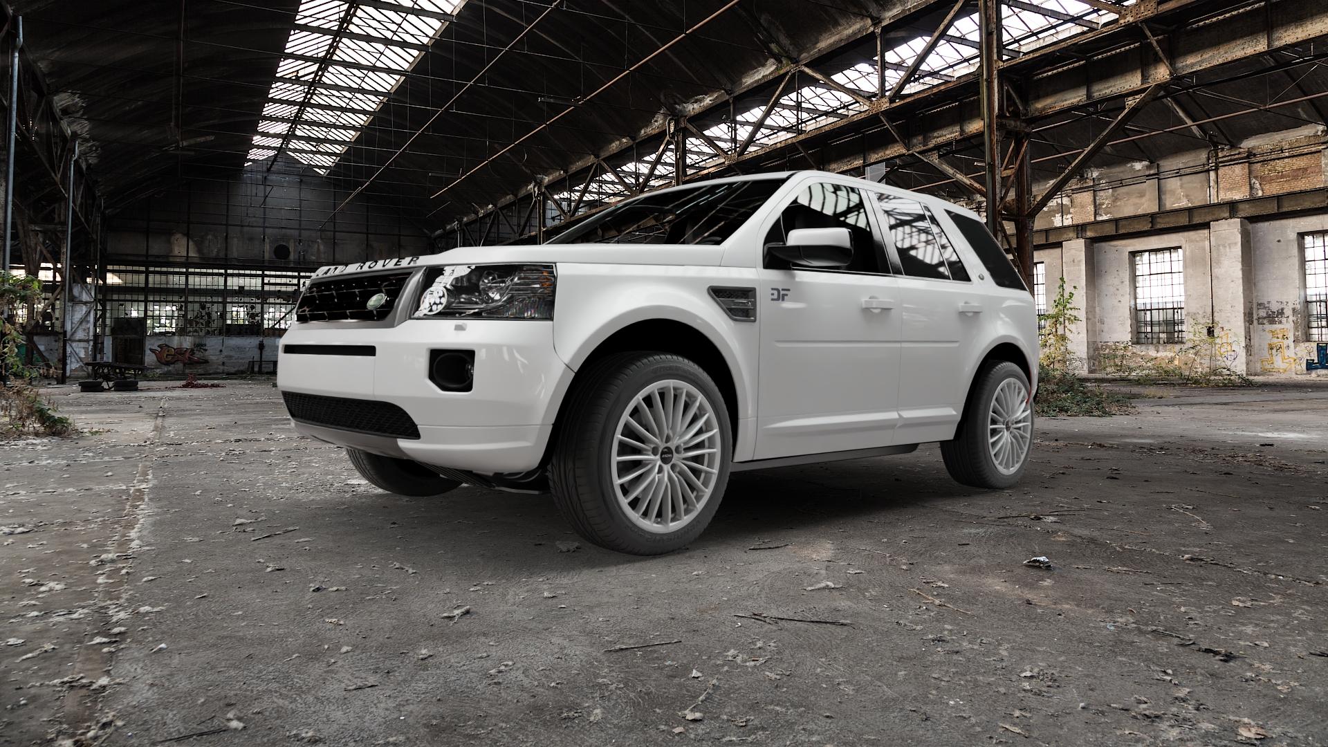 RONAL R68 HYPER GREY Felge mit Reifen grau silber in 19Zoll Winterfelge Alufelge auf weissem Land Rover Freelander II Typ LF ⬇️ mit 15mm Tieferlegung ⬇️ Old Industrial Hall_max5000mm_2022 Frontansicht_1