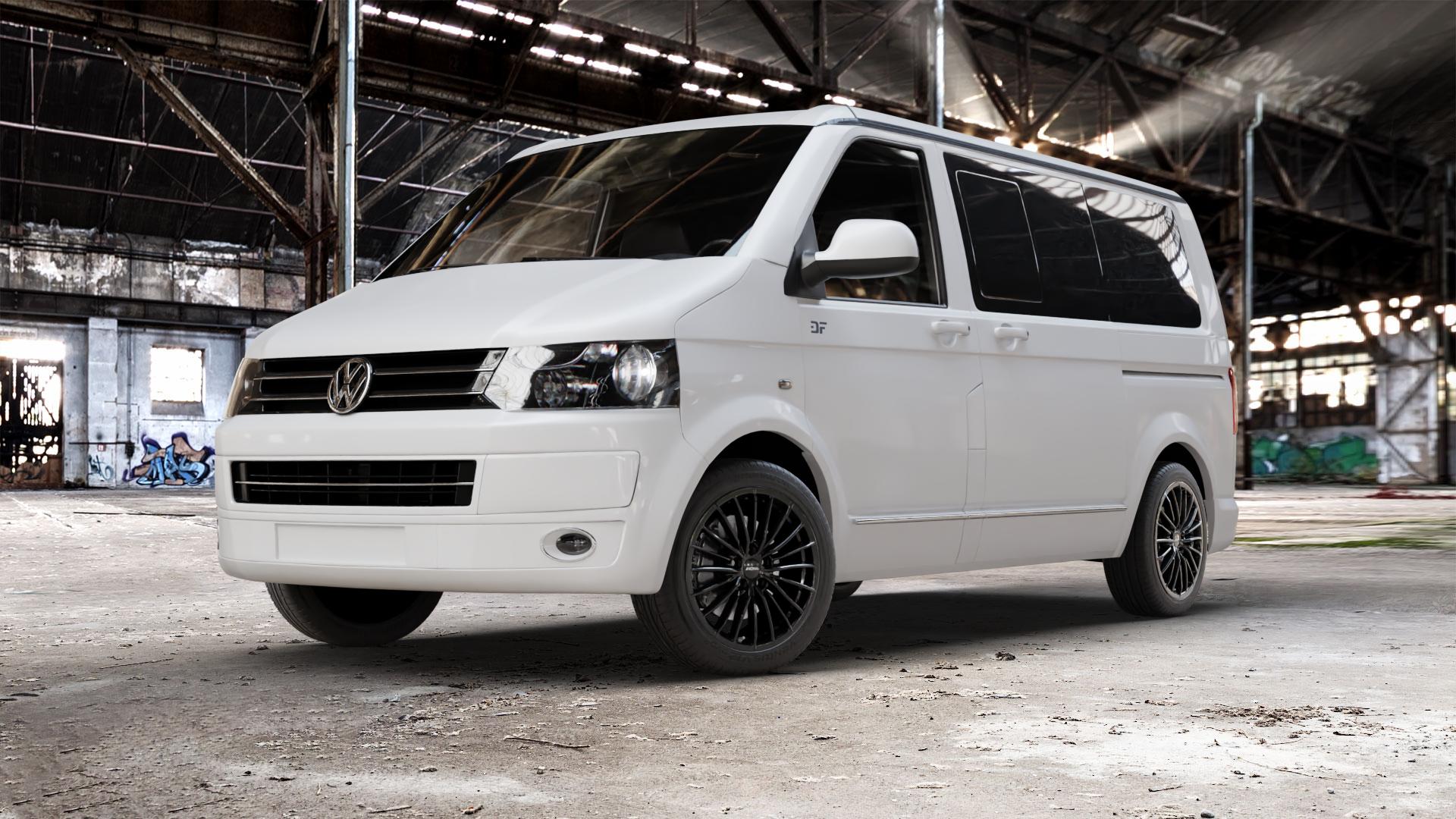 RONAL R68 JETBLACK Felge mit Reifen schwarz in 18Zoll Winterfelge Alufelge auf weissem Volkswagen (VW) T5 California ⬇️ mit 15mm Tieferlegung ⬇️ Old Industrial Hall_max_5300mm_2024 Frontansicht_1